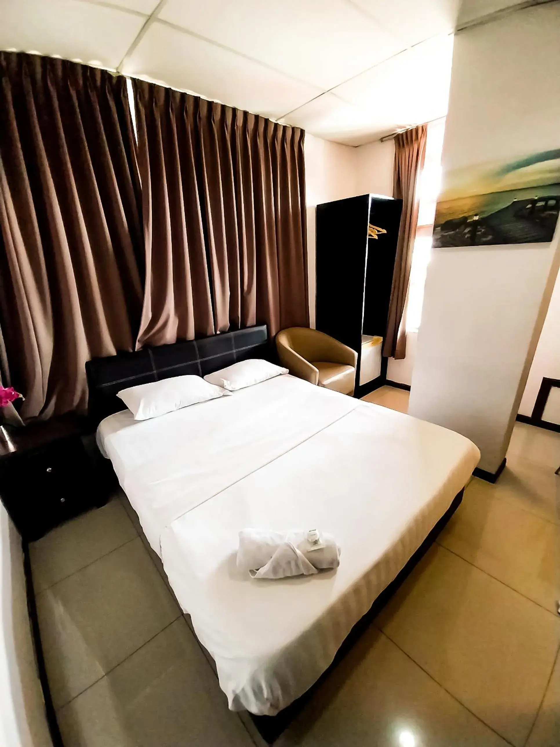 Standard Queen Room in MB Budget Hotel Standard Queen Room in MB Budget Hotel