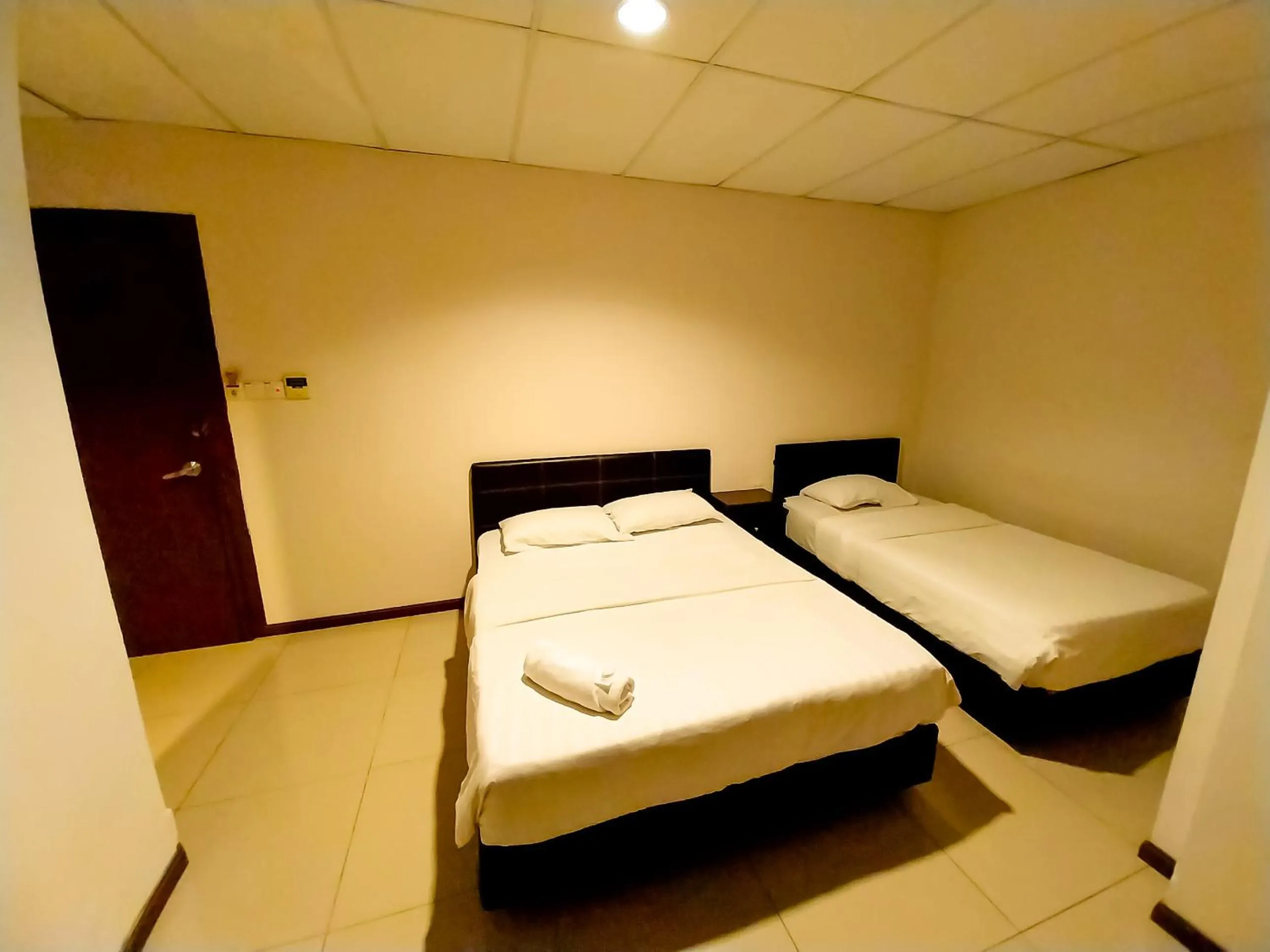 Bedroom in MB Budget Hotel