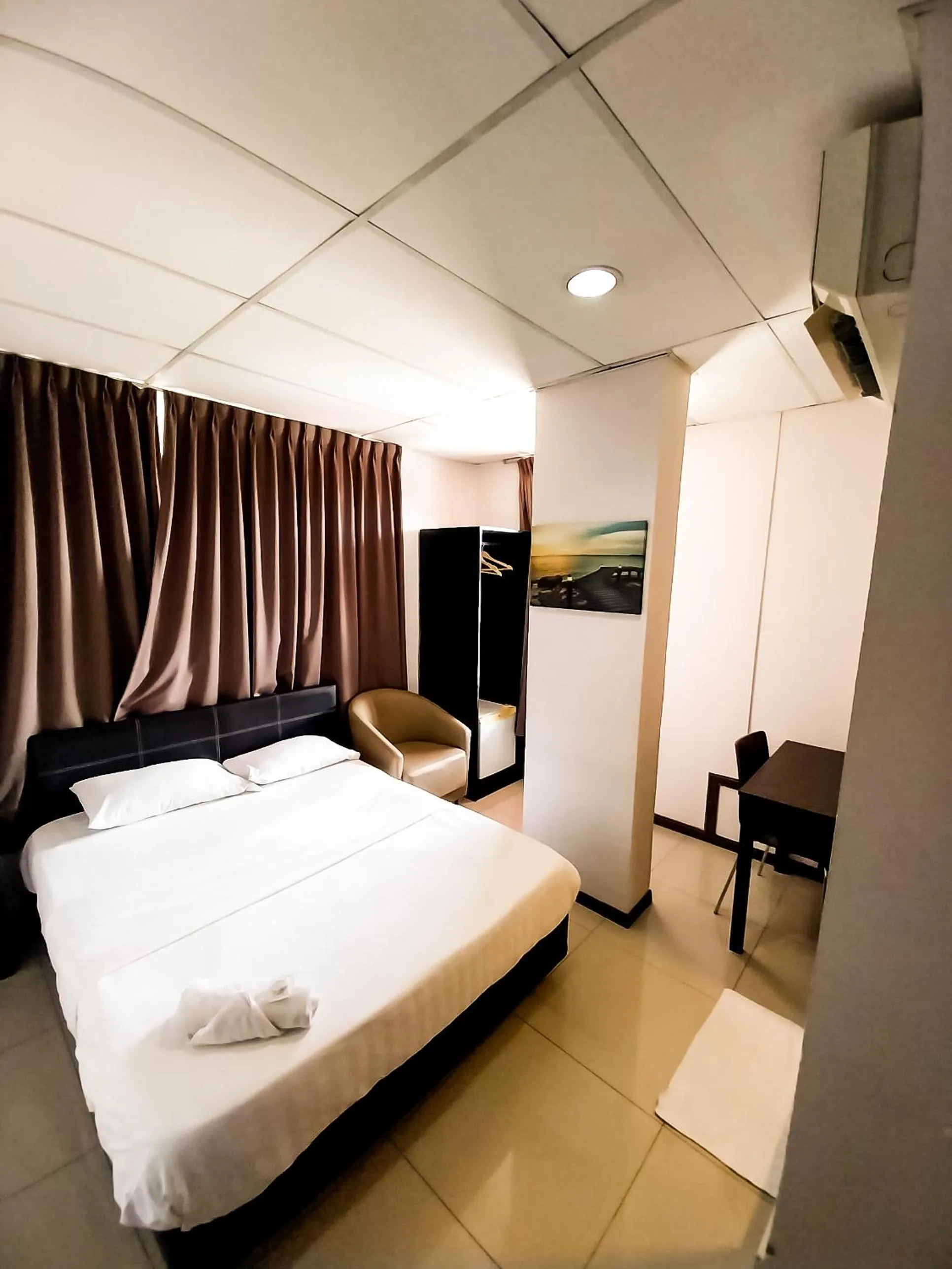 Bedroom in MB Budget Hotel