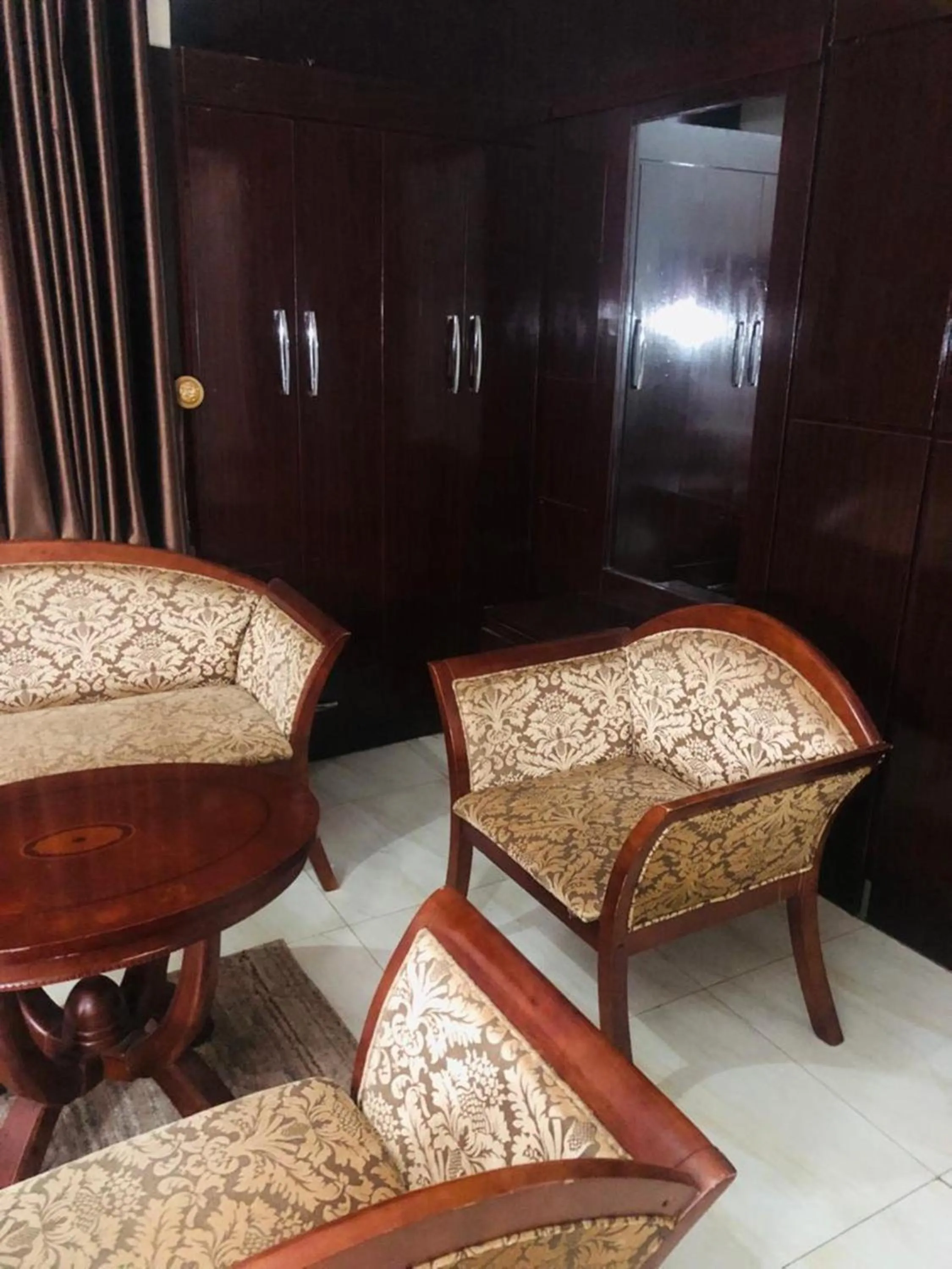 Seating area in MCLORRETS SUITES