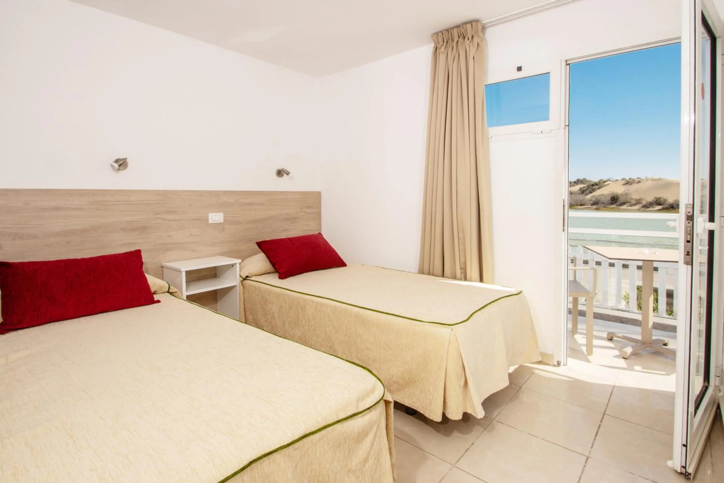 Bed in Apartamentos Cocoteros