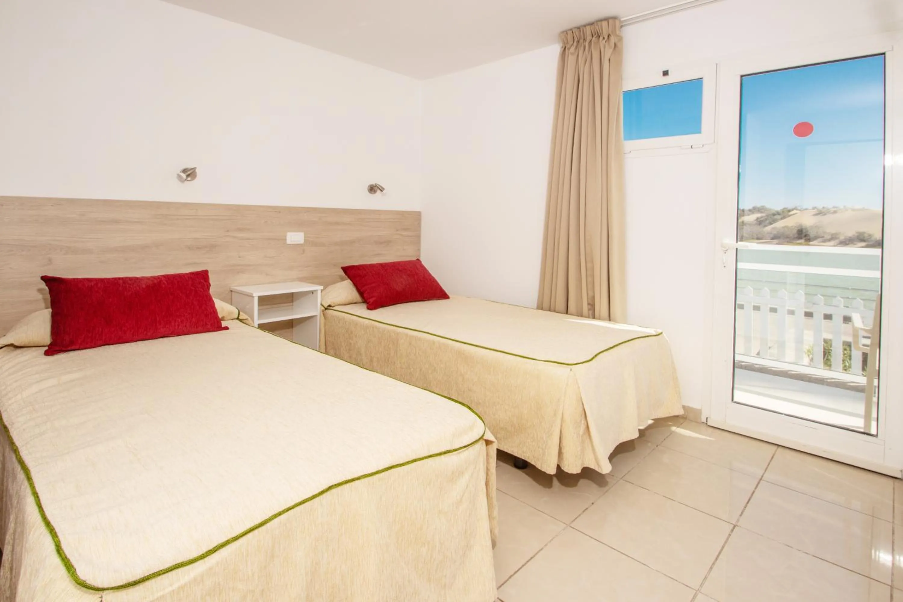 Bed in Apartamentos Cocoteros