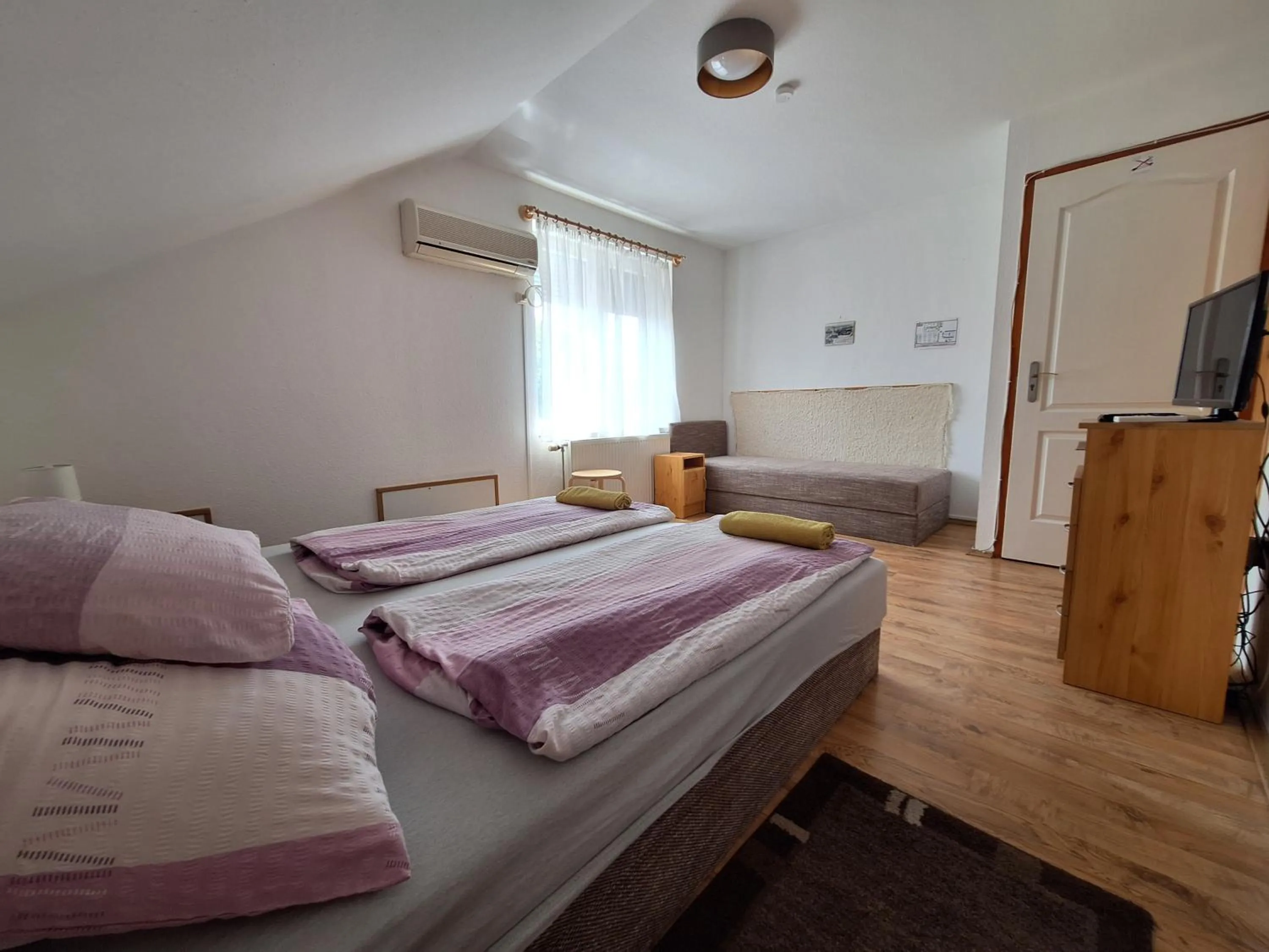 Bed in Lila Akác Vendégház Esztergom