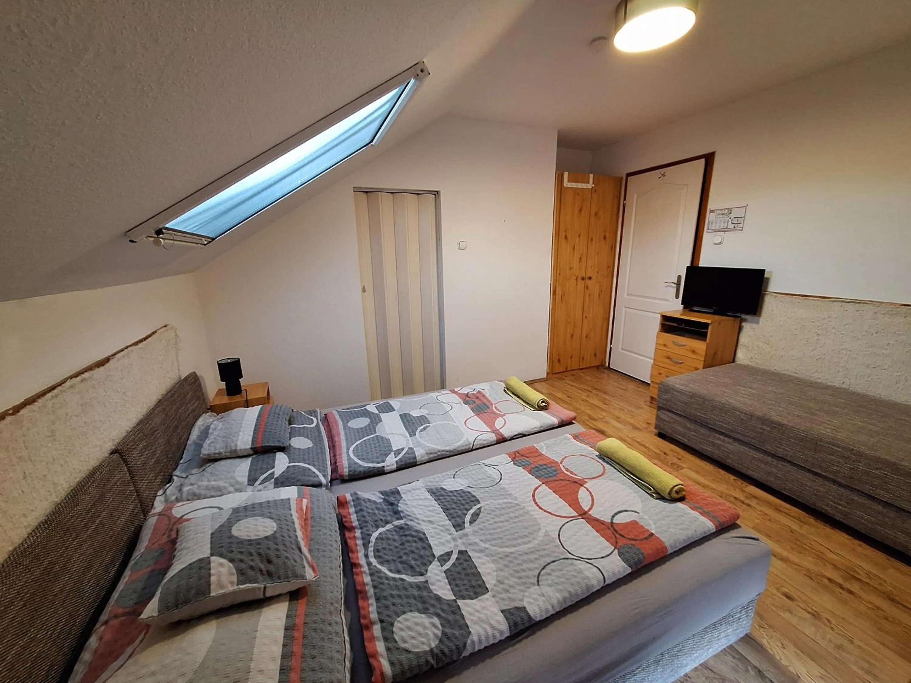 Bed in Lila Akác Vendégház Esztergom