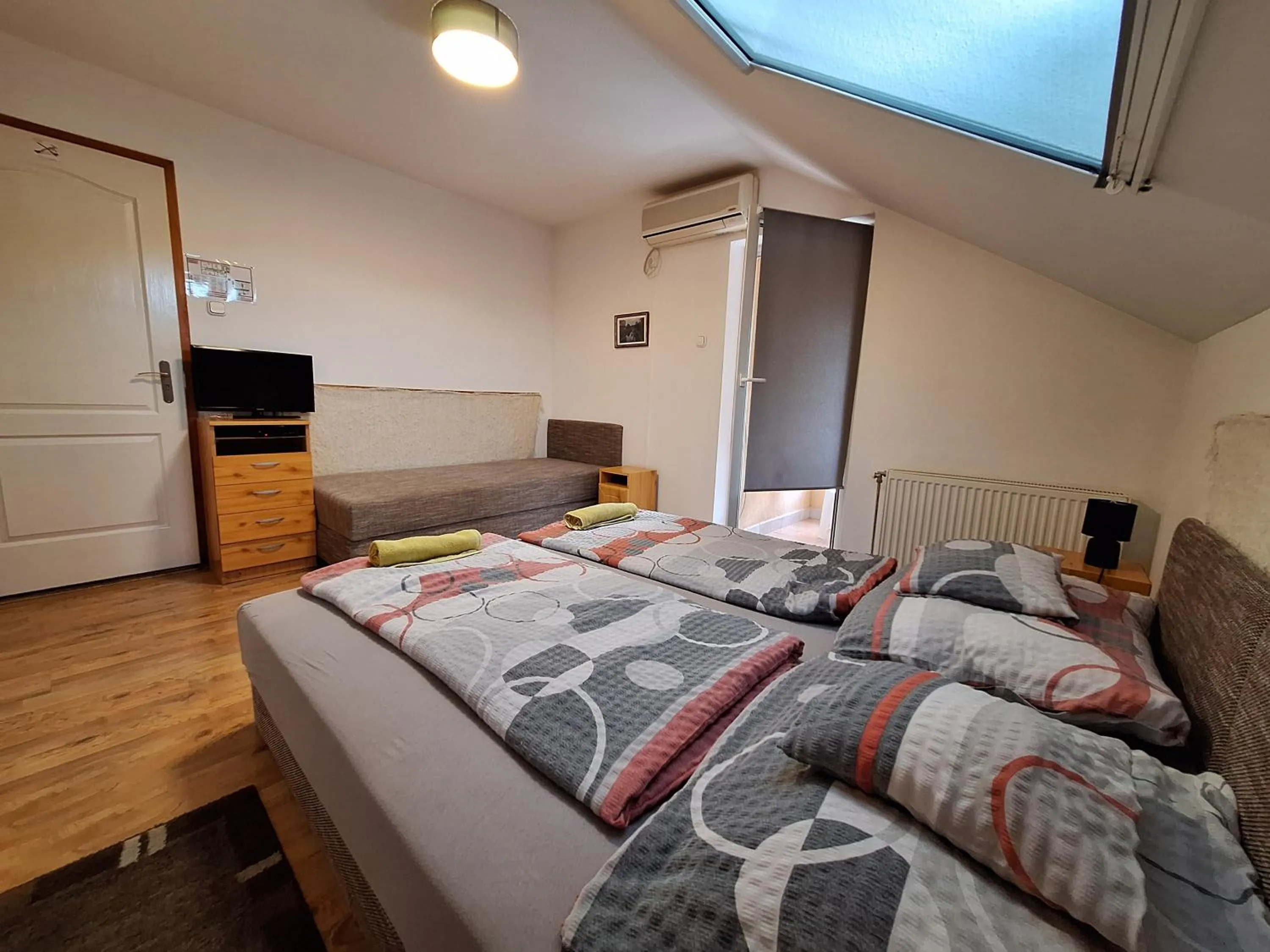 Bed in Lila Akác Vendégház Esztergom