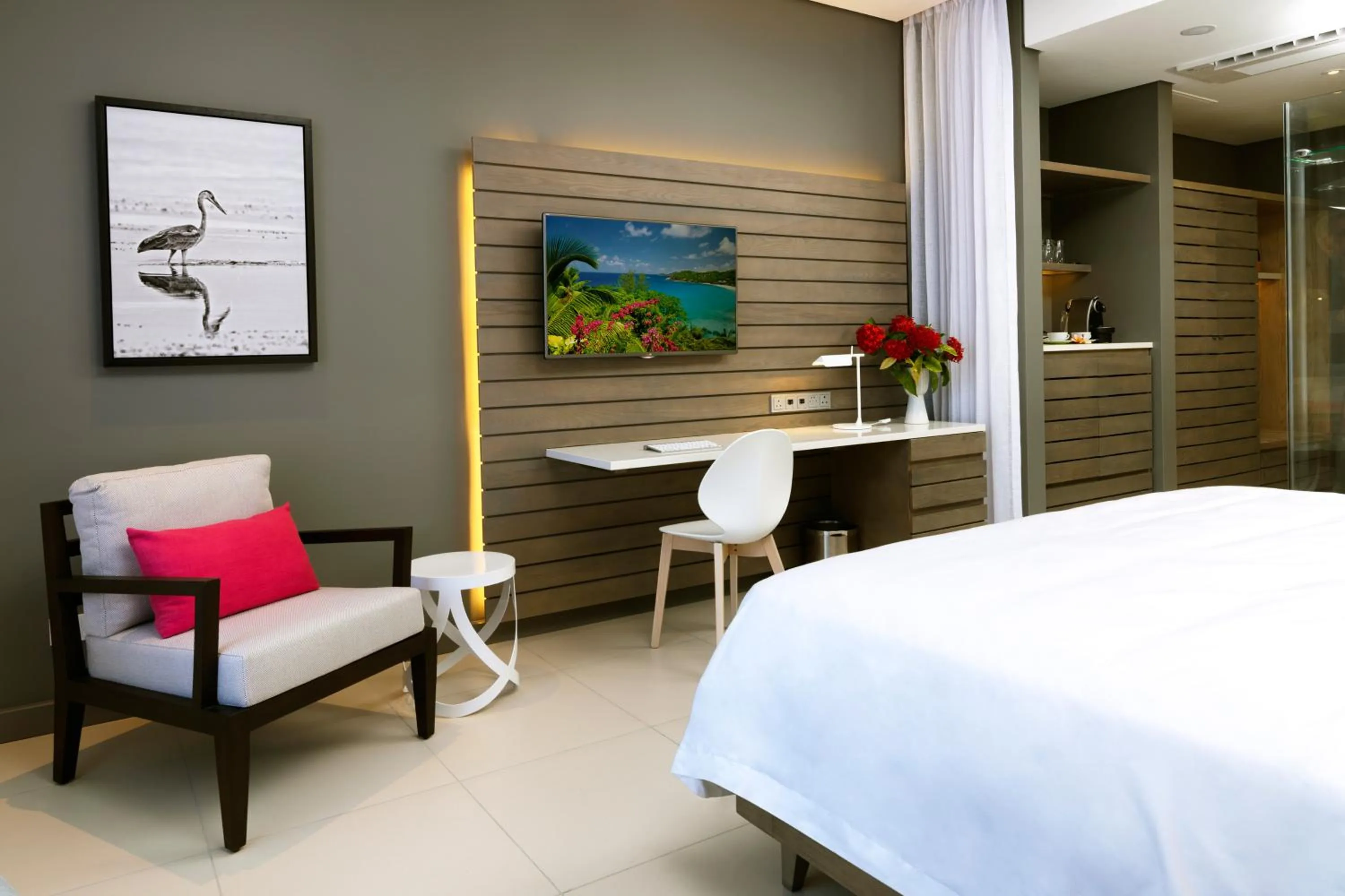 Seating area, Bed in Eden Bleu Hotel