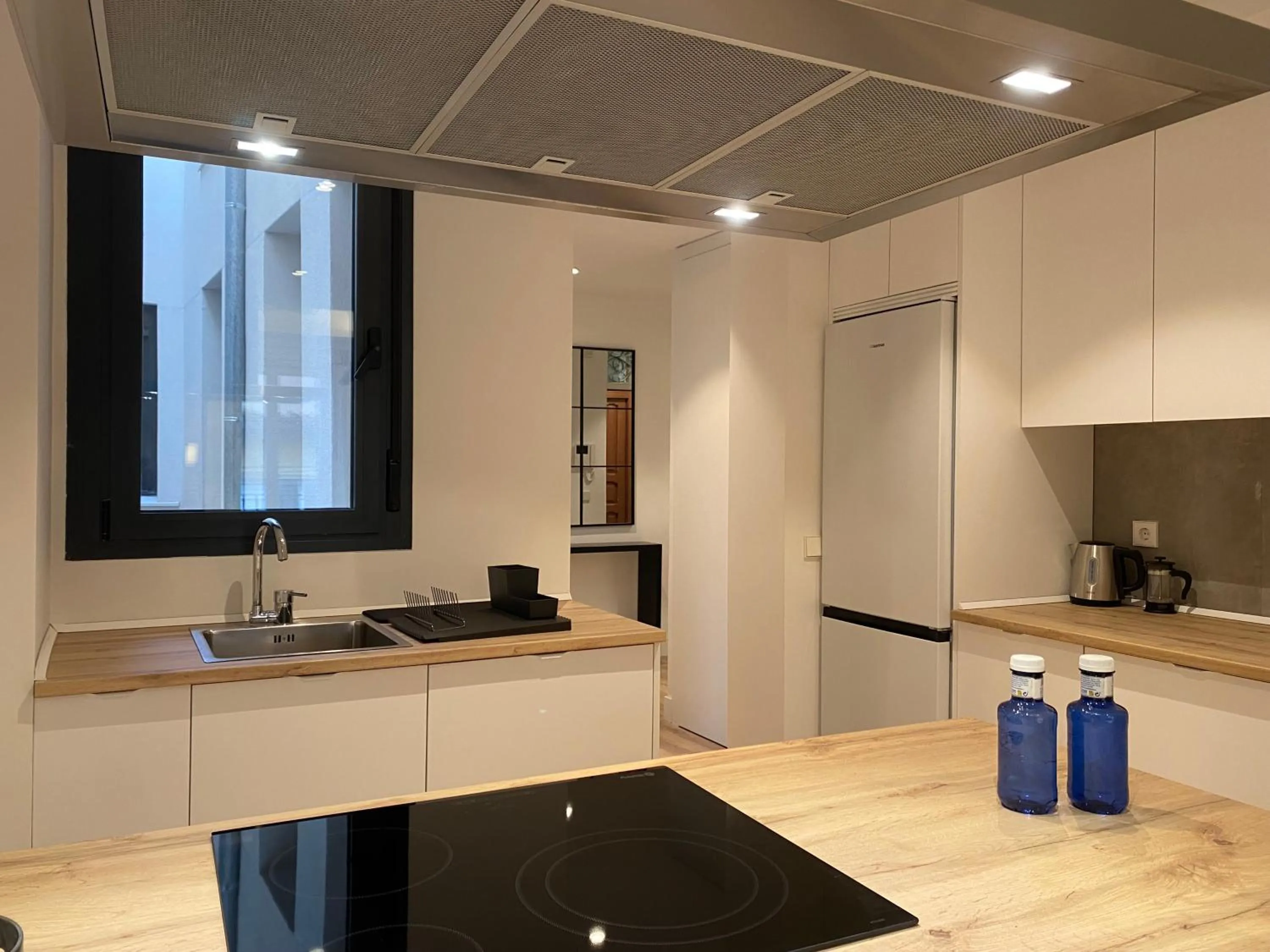 Kitchen or kitchenette in Fomento by Wynwood House