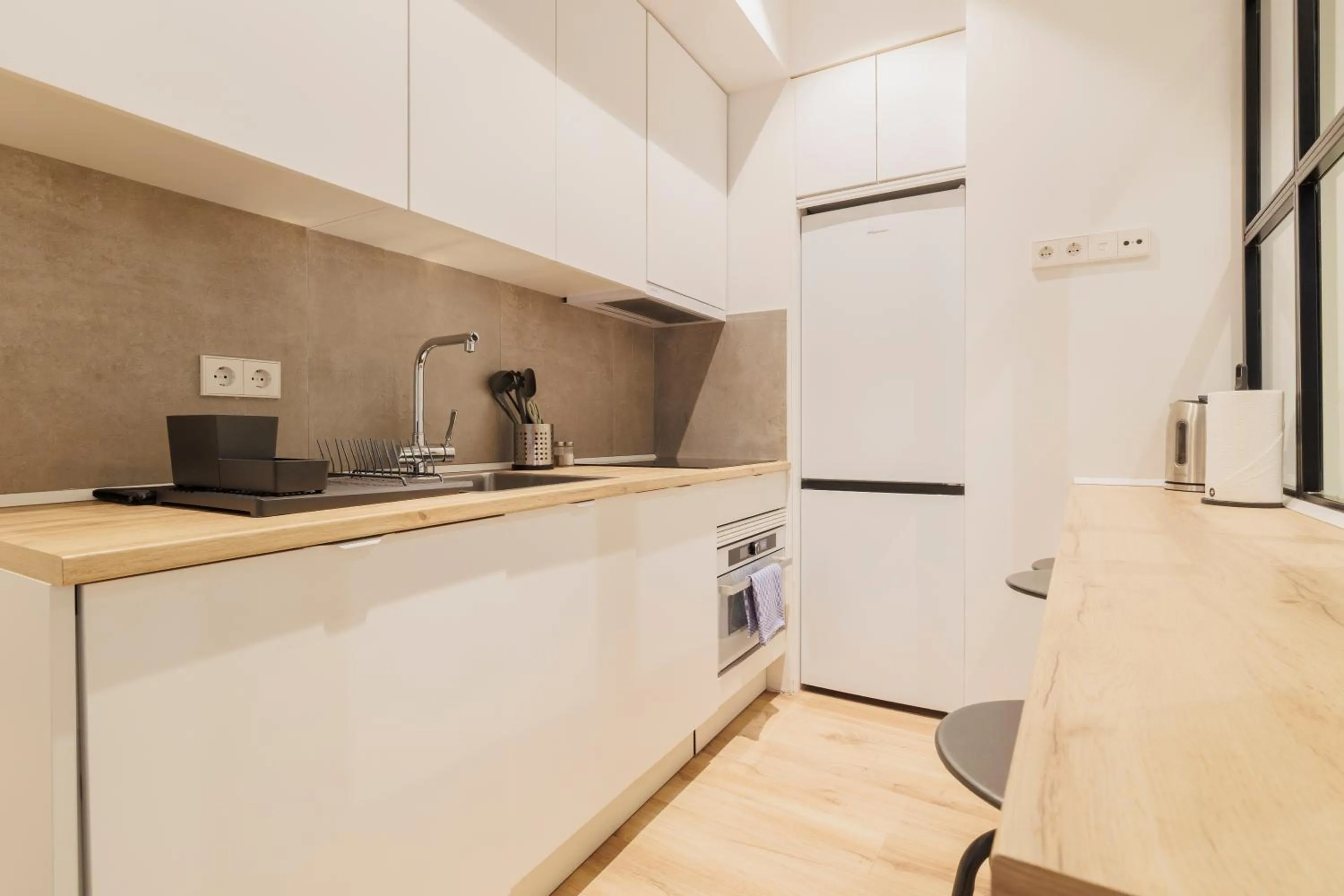 Kitchen or kitchenette in Fomento by Wynwood House