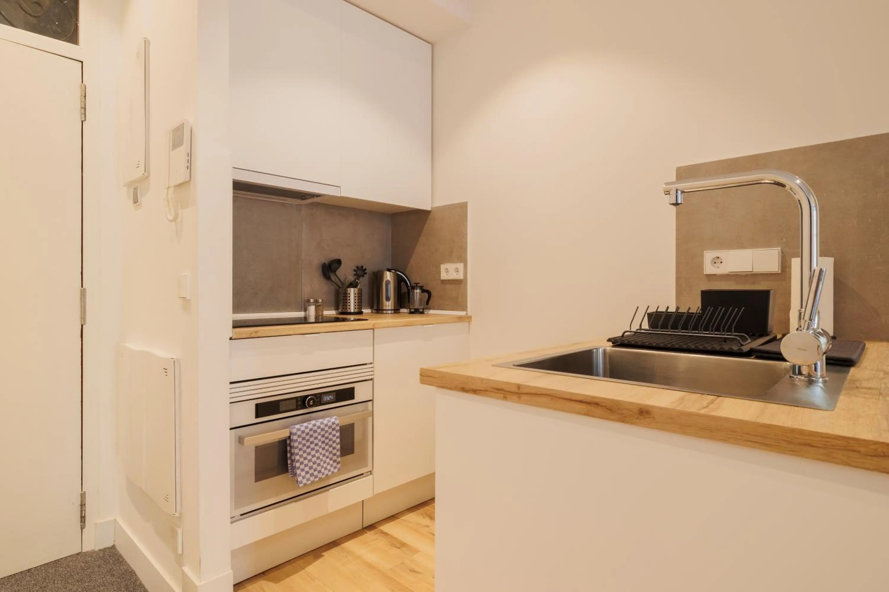 Kitchen or kitchenette in Fomento by Wynwood House