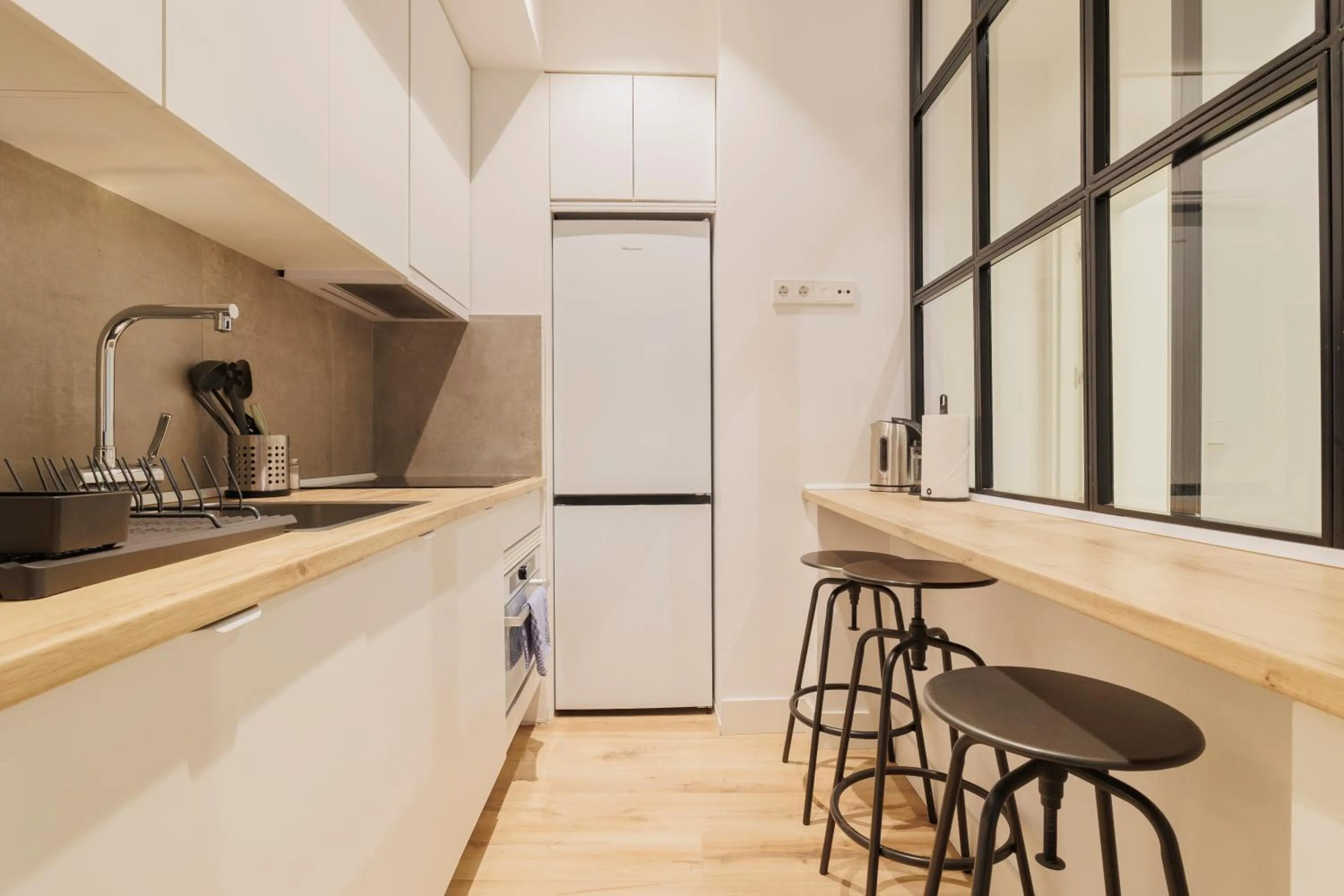 Kitchen or kitchenette in Fomento by Wynwood House