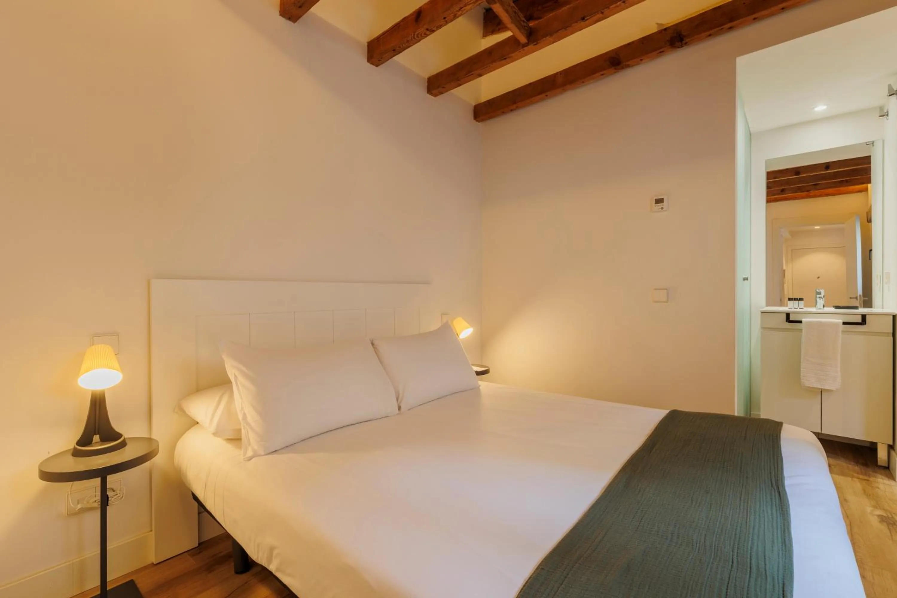 Bedroom, Bed in Fomento by Wynwood House