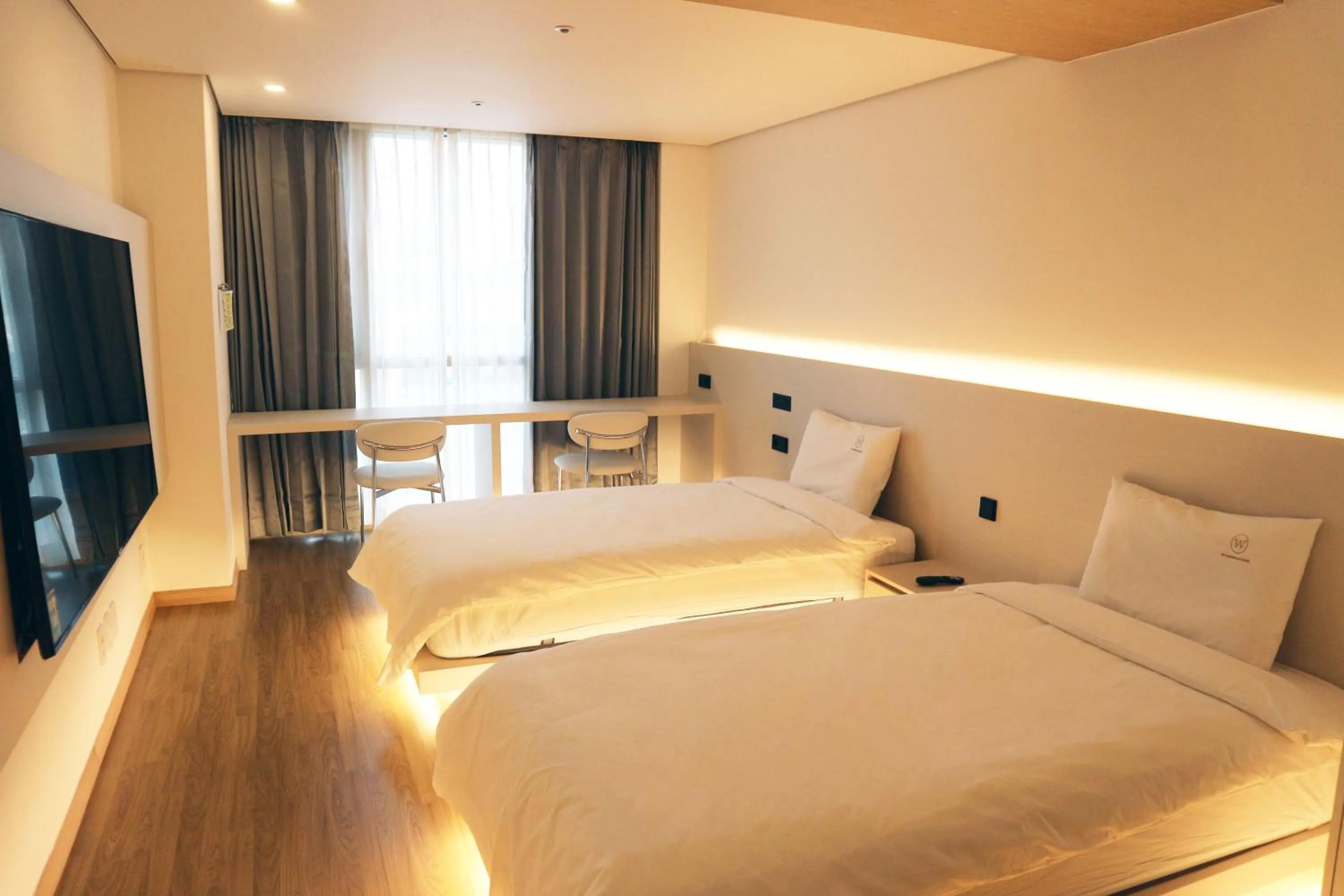 Bed in W Residence Hotel Centum City