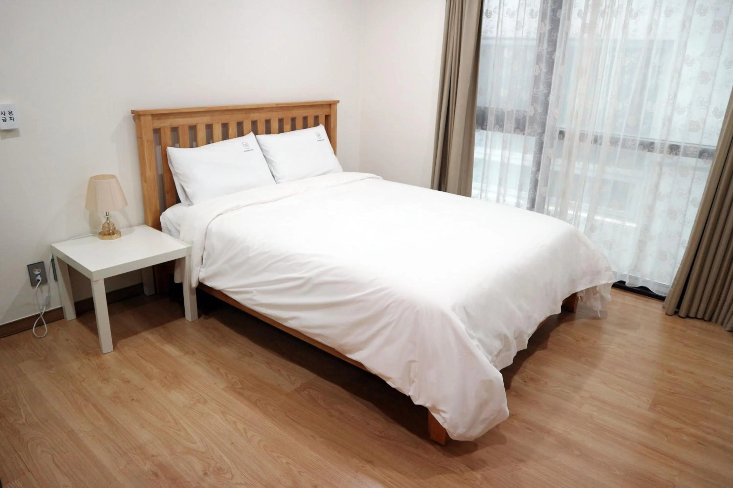 Bed in W Residence Hotel Centum City