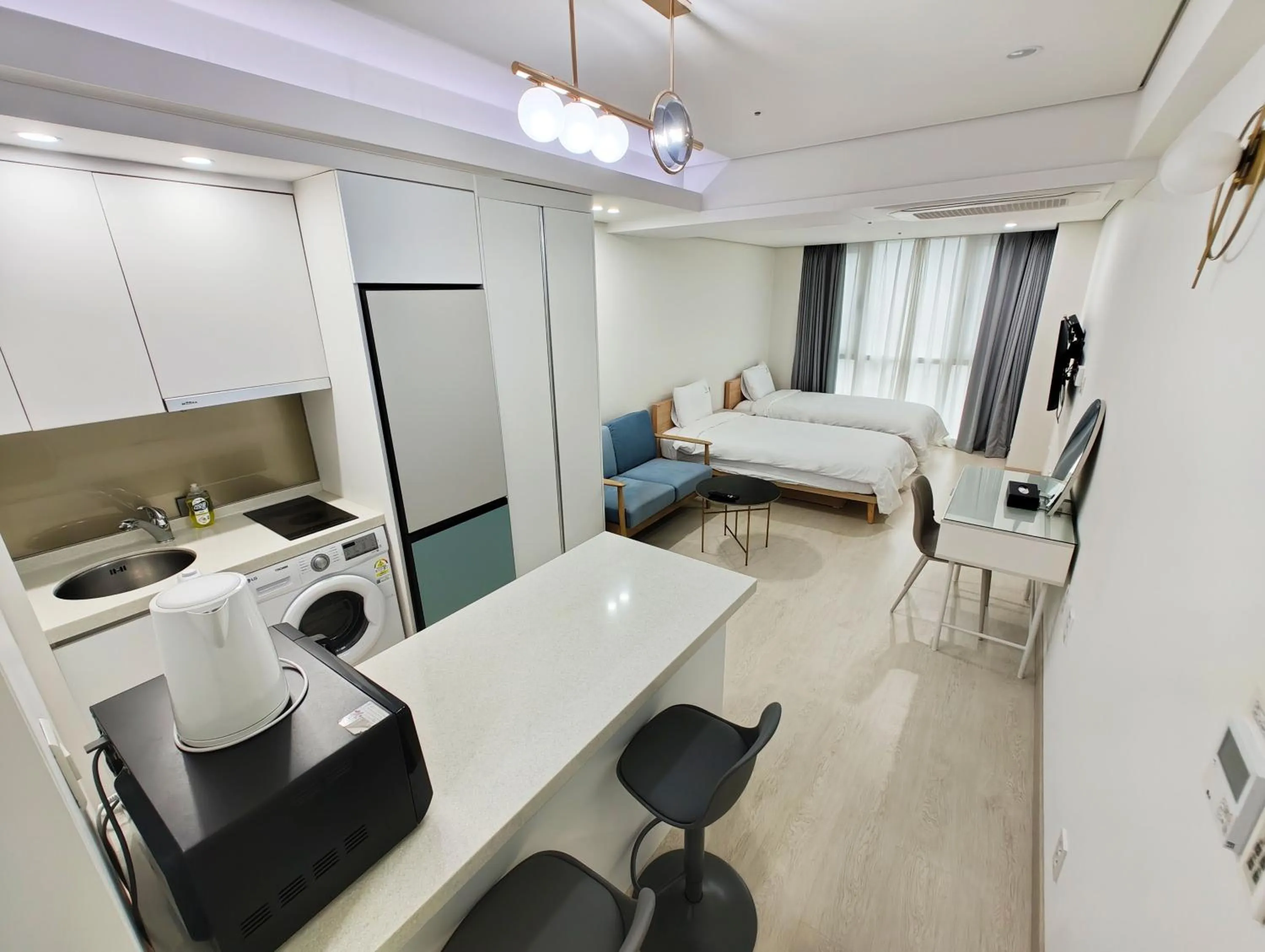 Bed in W Residence Hotel Centum City