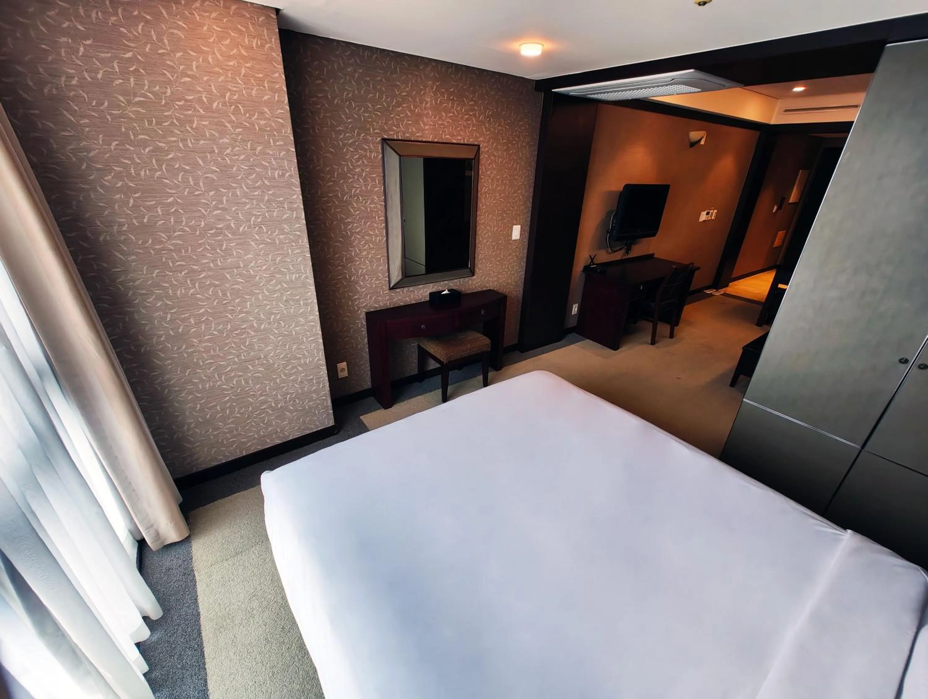 Bed in W Residence Hotel Centum City