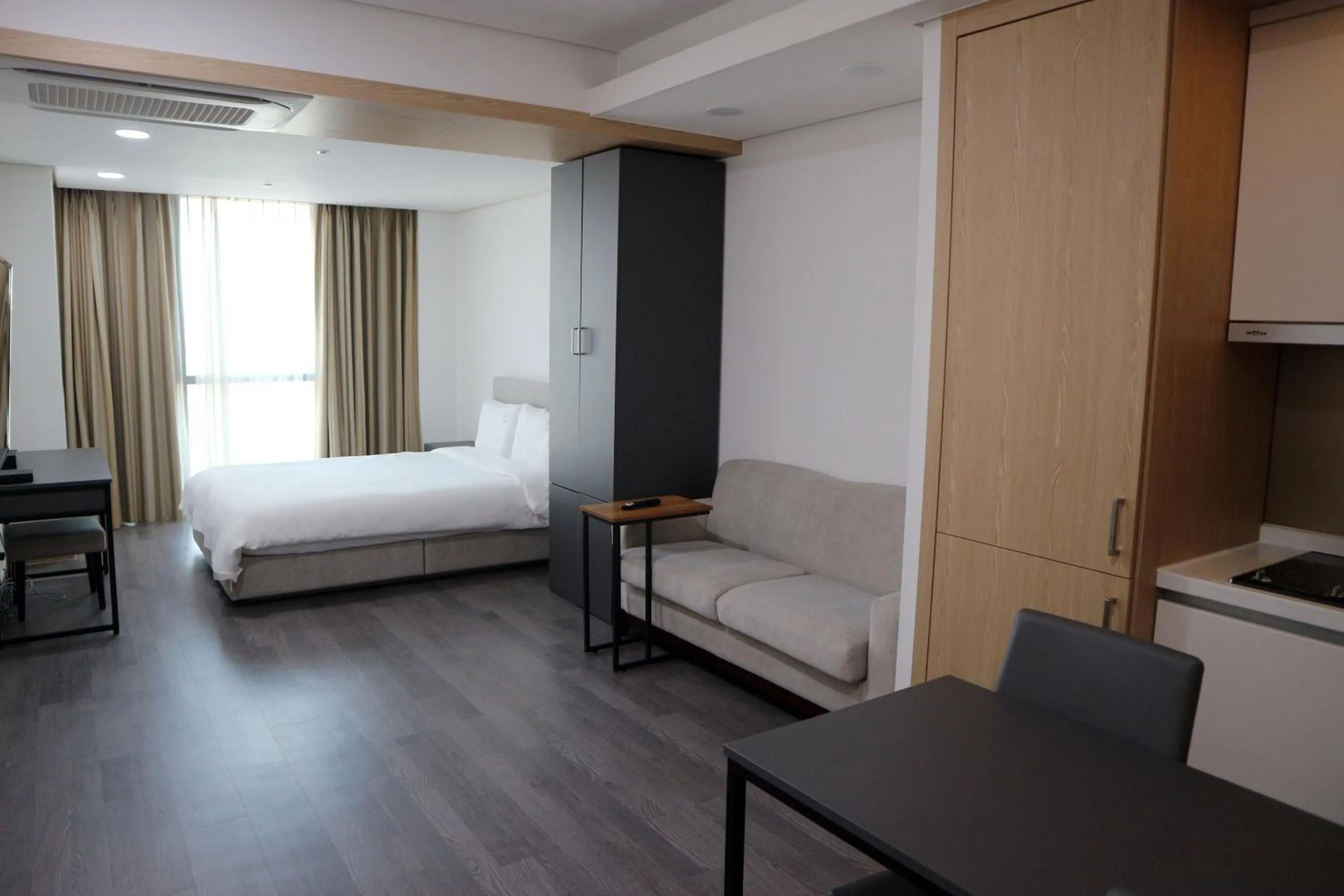 Bed in W Residence Hotel Centum City