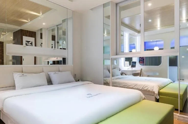 Bed in Zara Hotel Peace Square