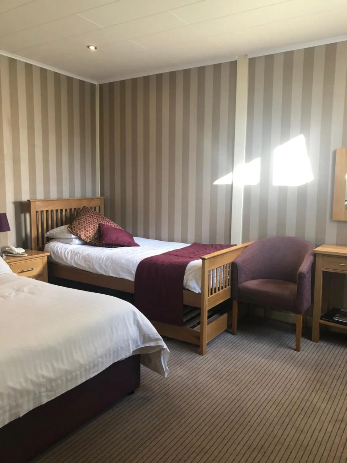 Bed in The Dog & Partridge Country Inn