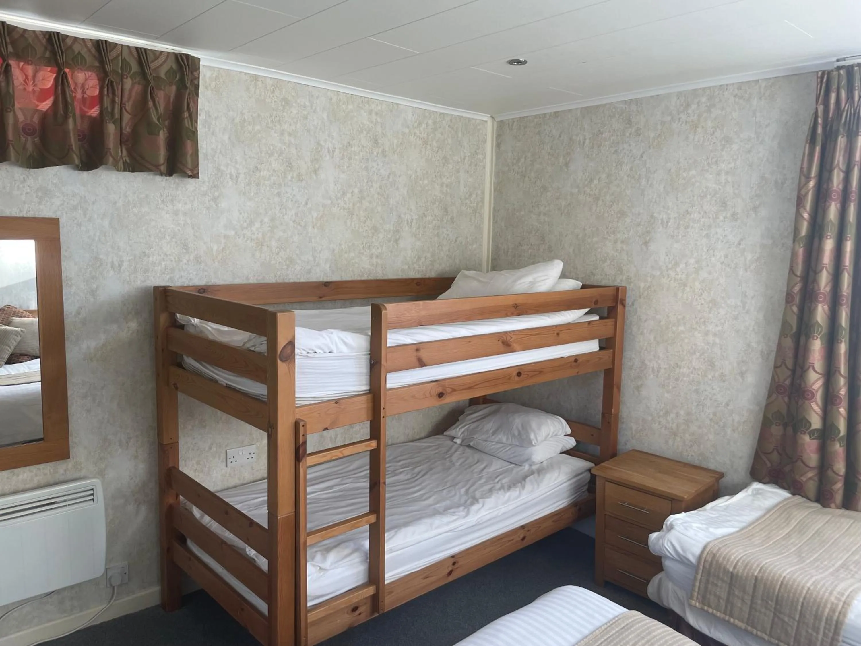 Bed in The Dog & Partridge Country Inn