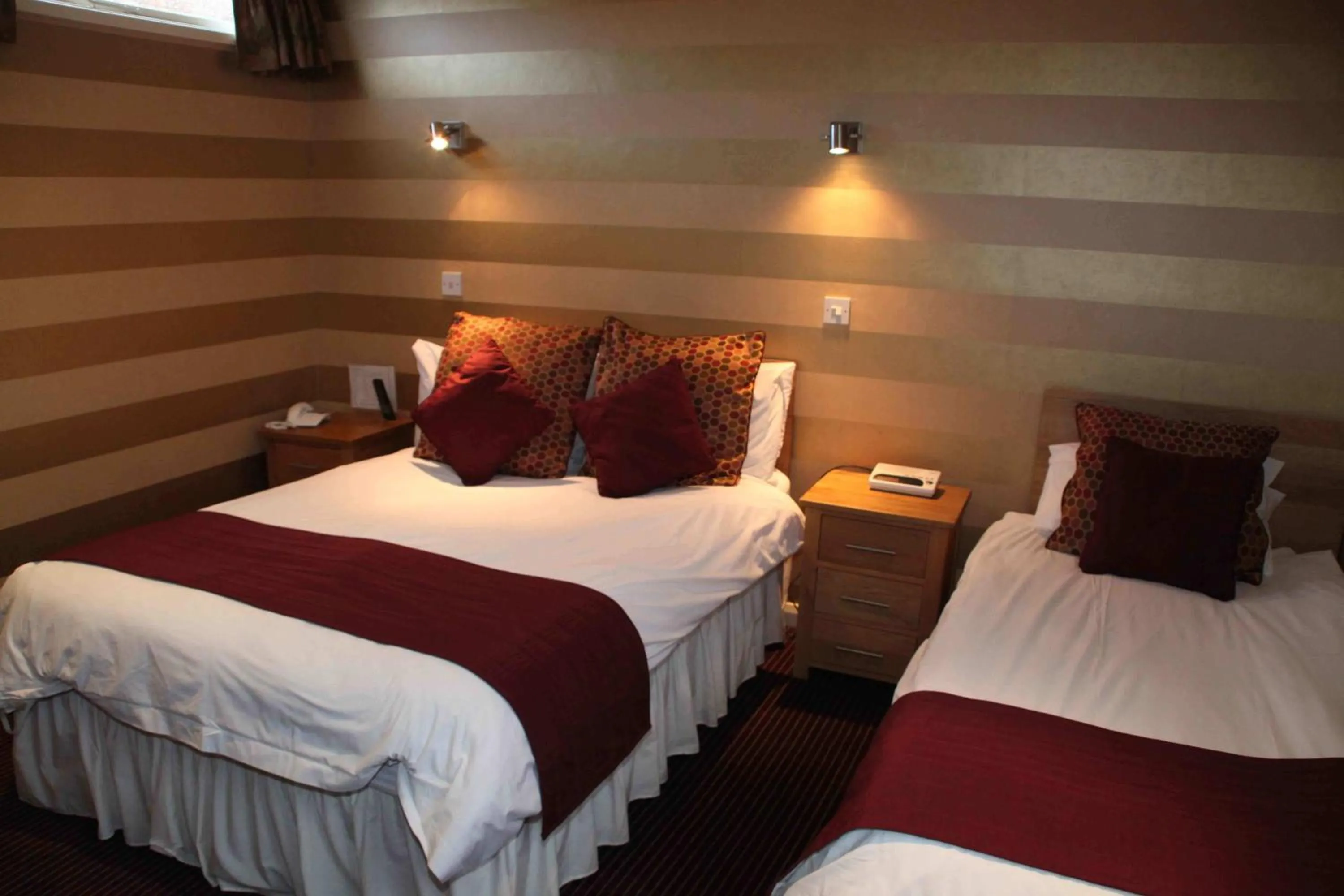 Bed in The Dog & Partridge Country Inn