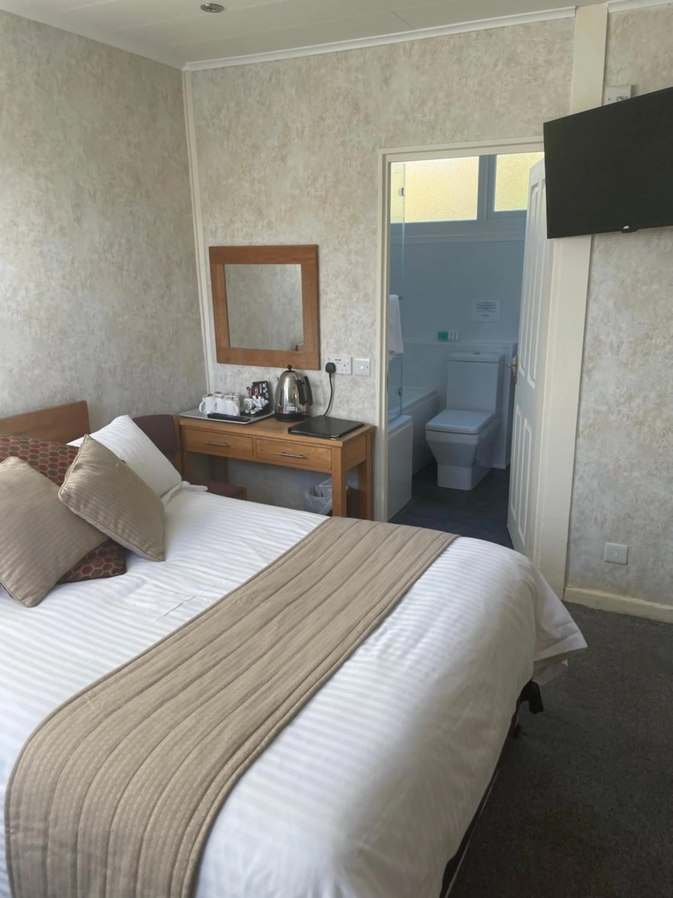 Bed in The Dog & Partridge Country Inn