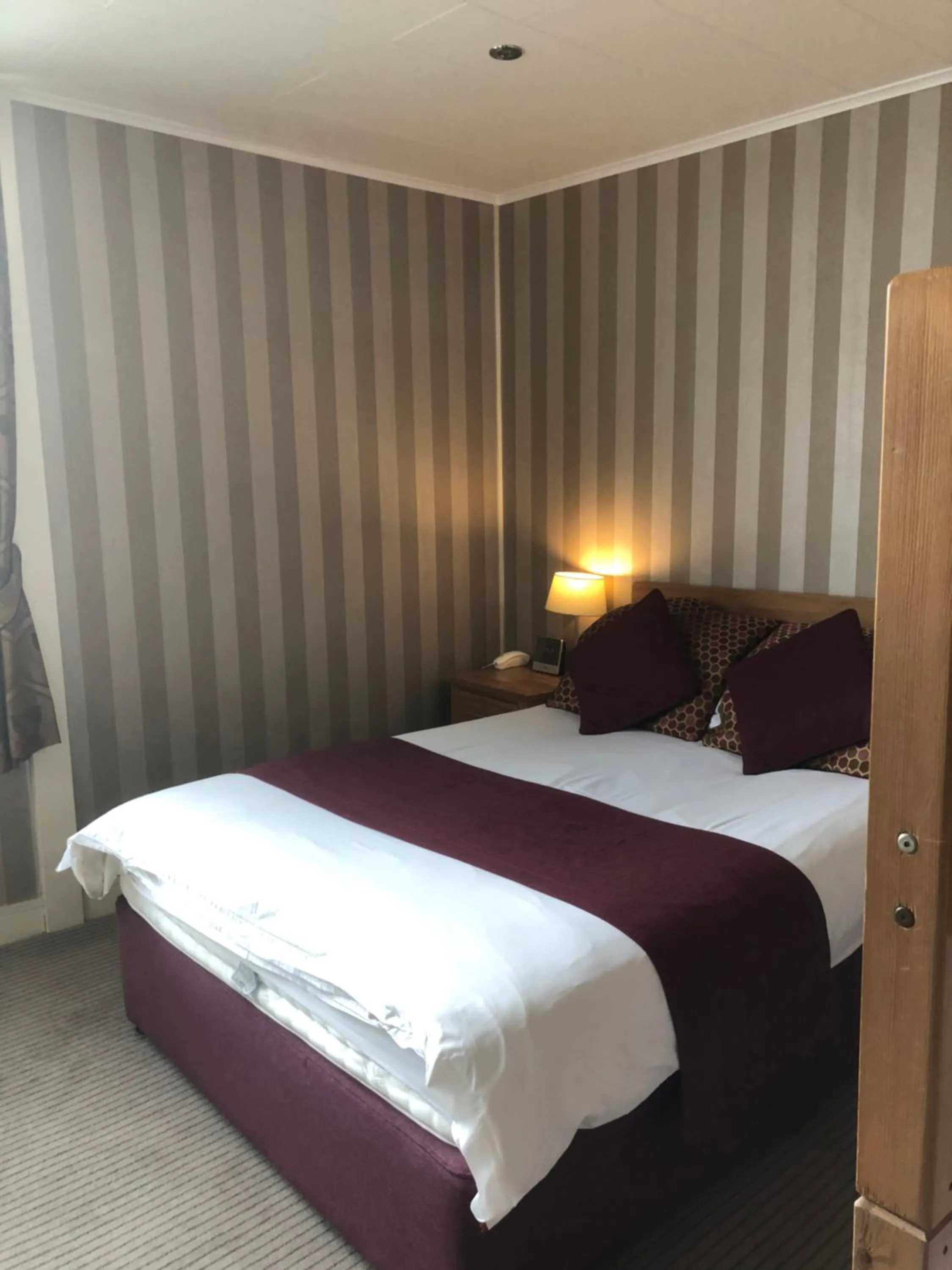 Bed in The Dog & Partridge Country Inn