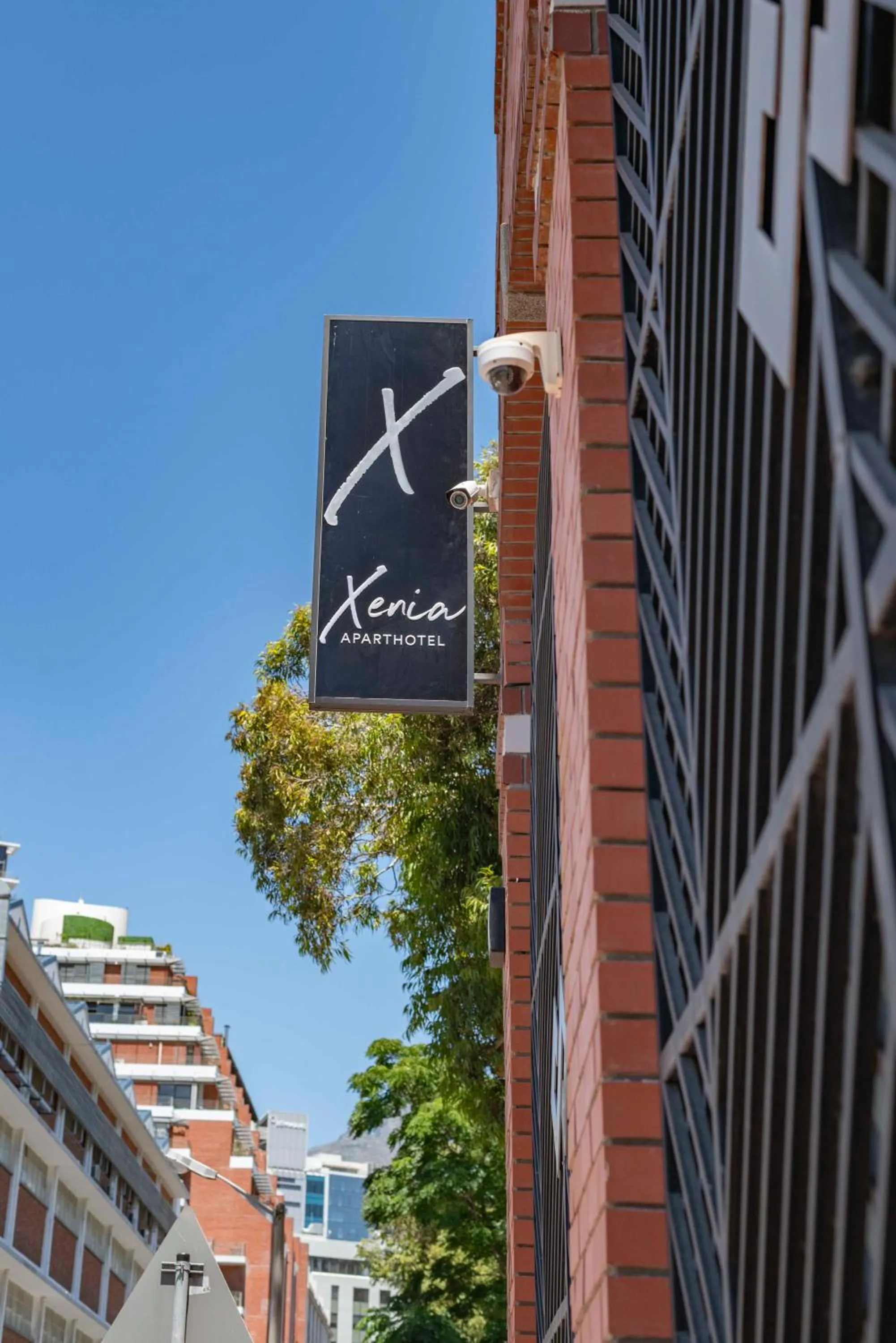 Property logo or sign in Xenia Aparthotel by Totalstay