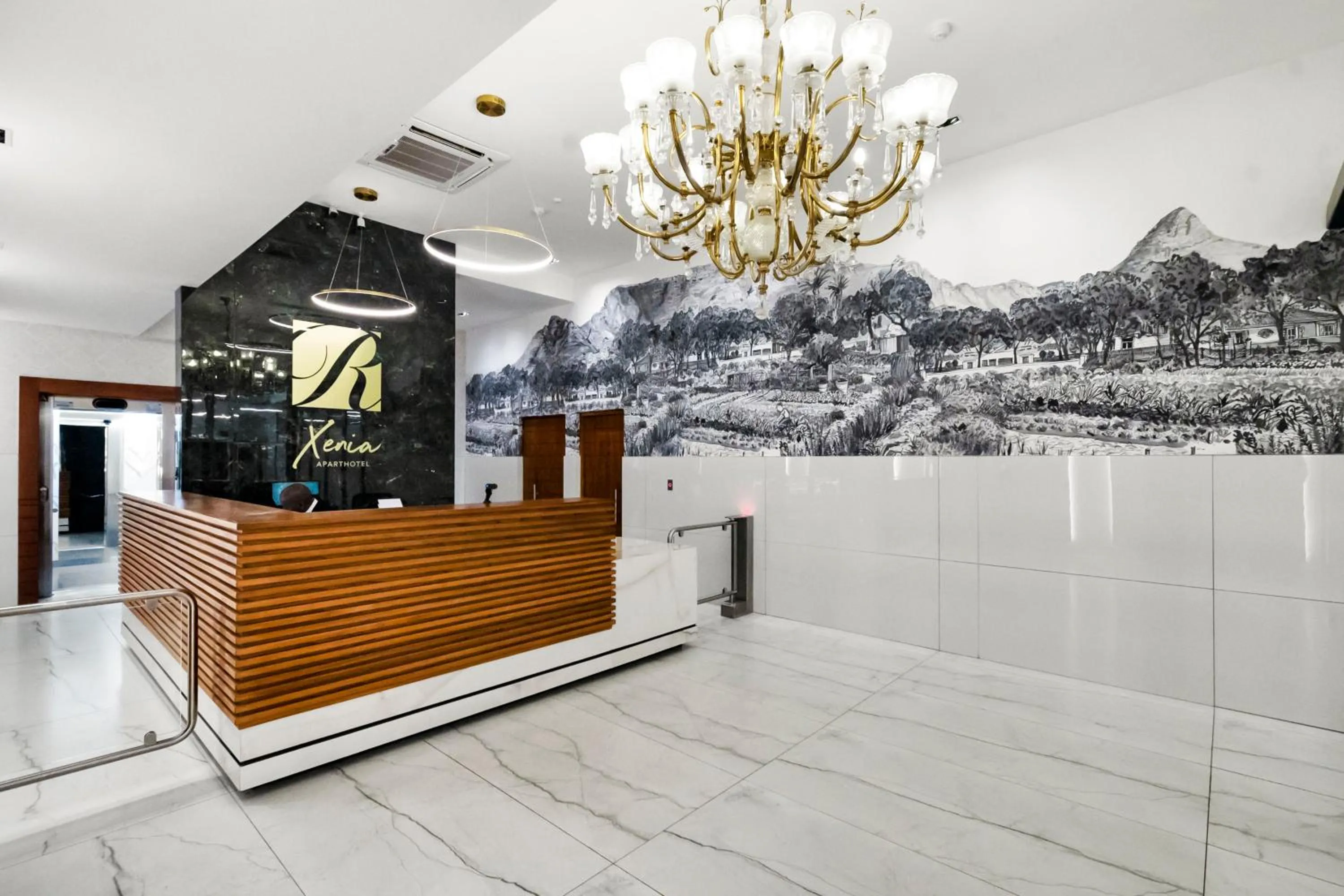 Lobby or reception in Xenia Aparthotel by Totalstay