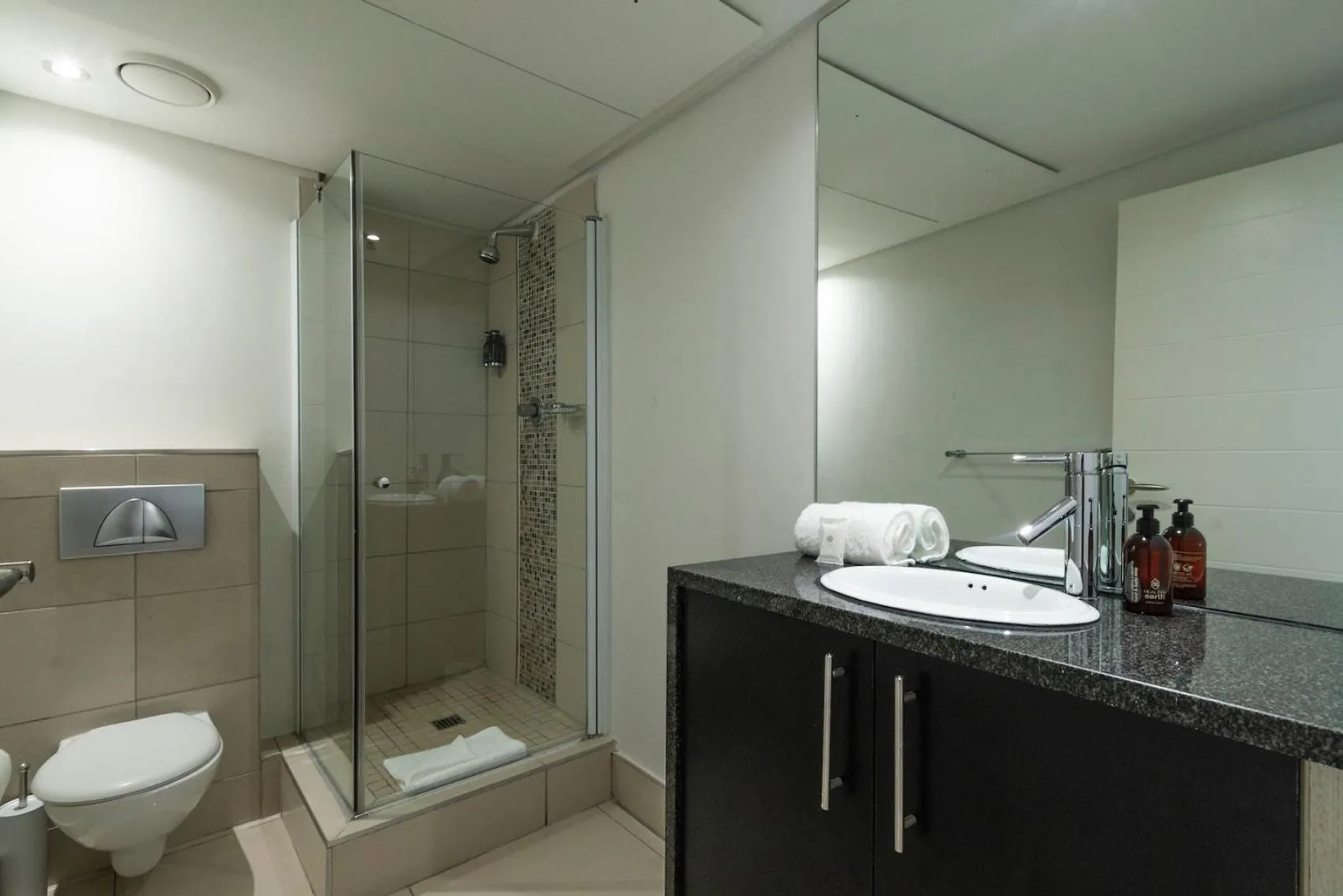 Bathroom in Xenia Aparthotel by Totalstay
