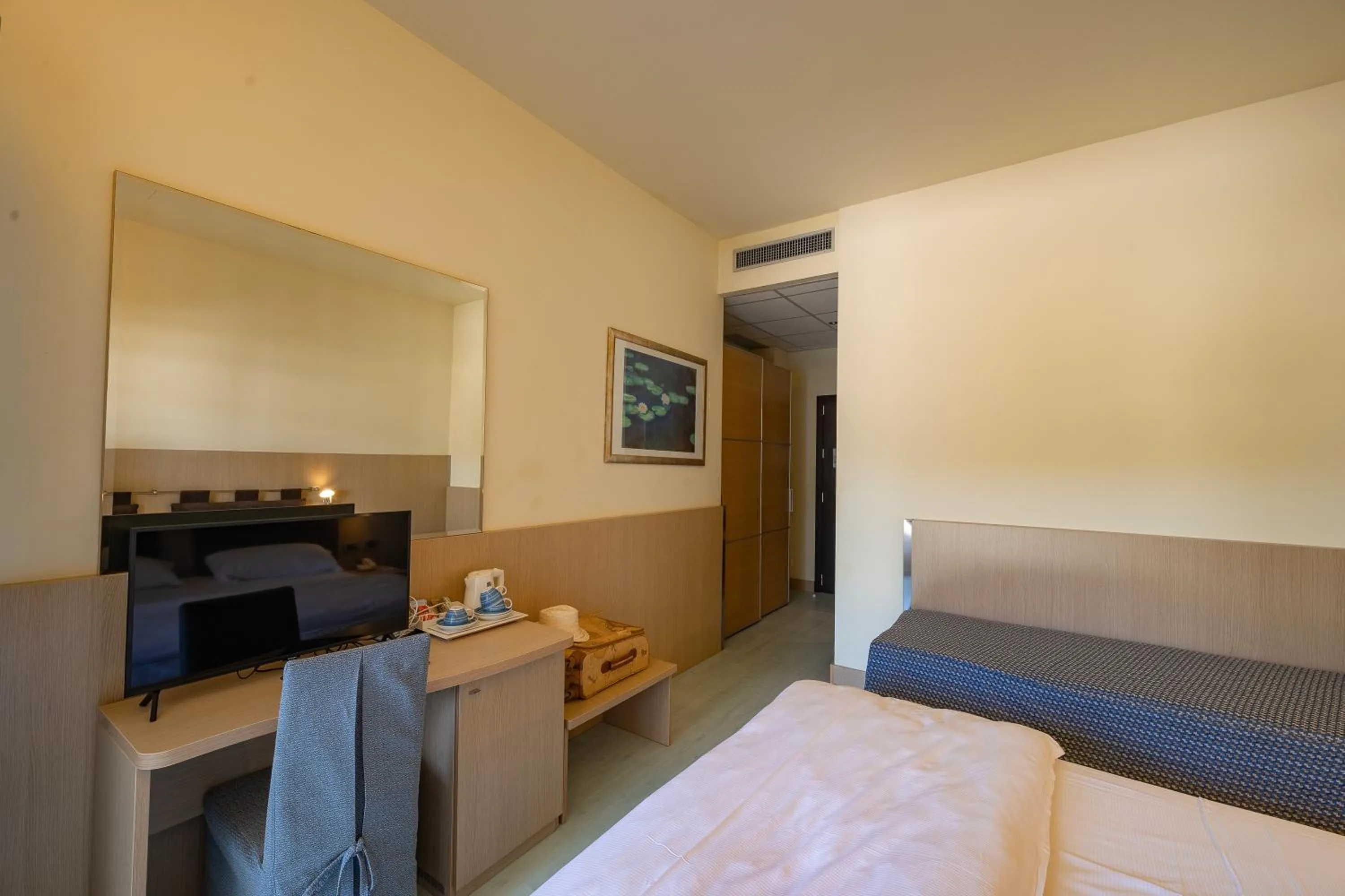 Bed in Il Tridente Hotel