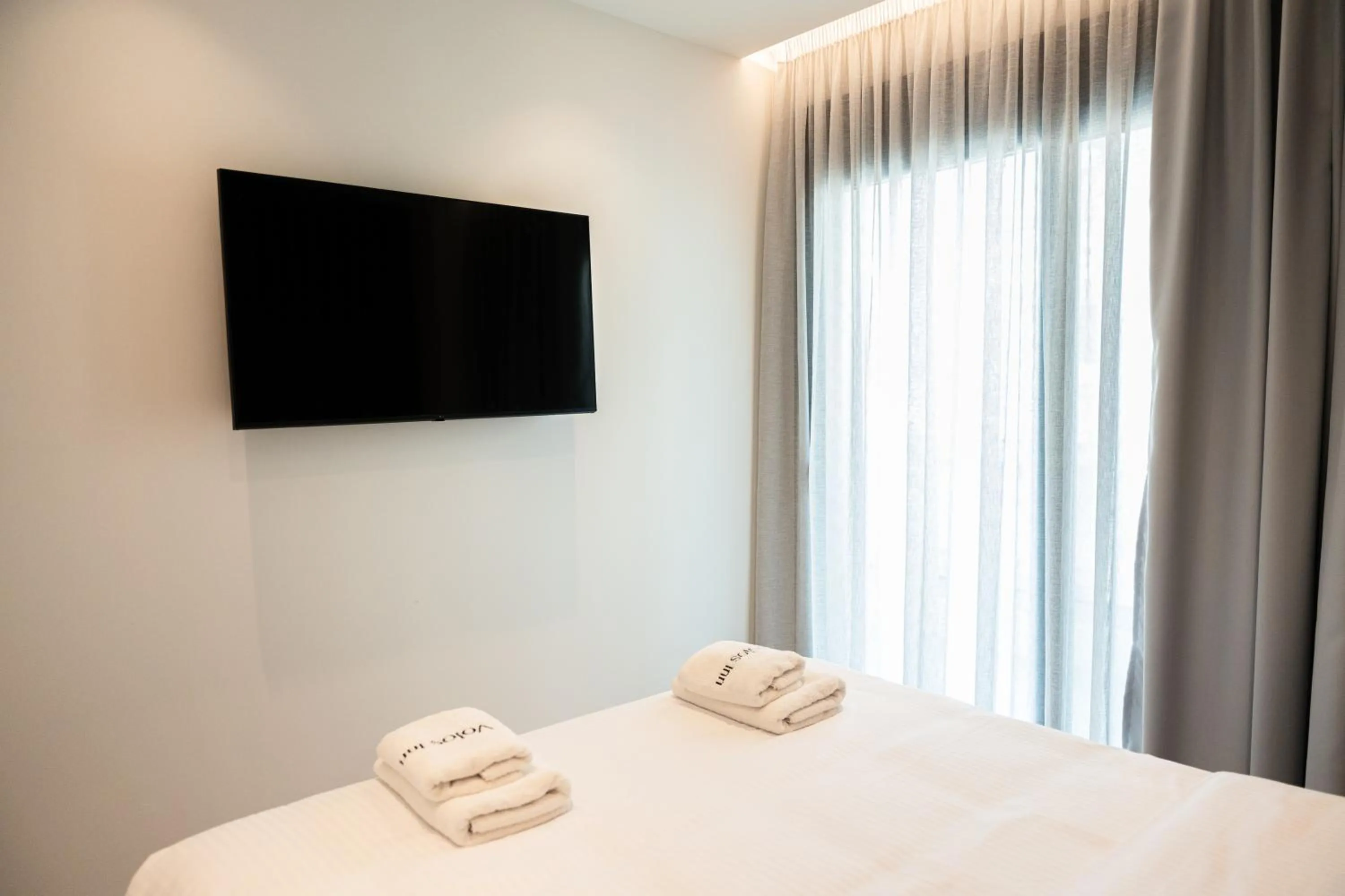 Bed in Volos Inn Hotel