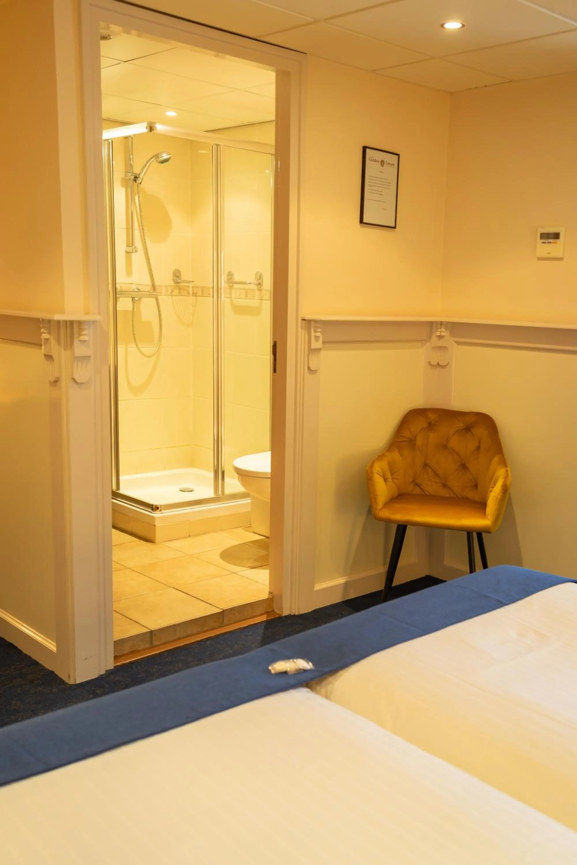 Bed in Hotel de Gulden Leeuw