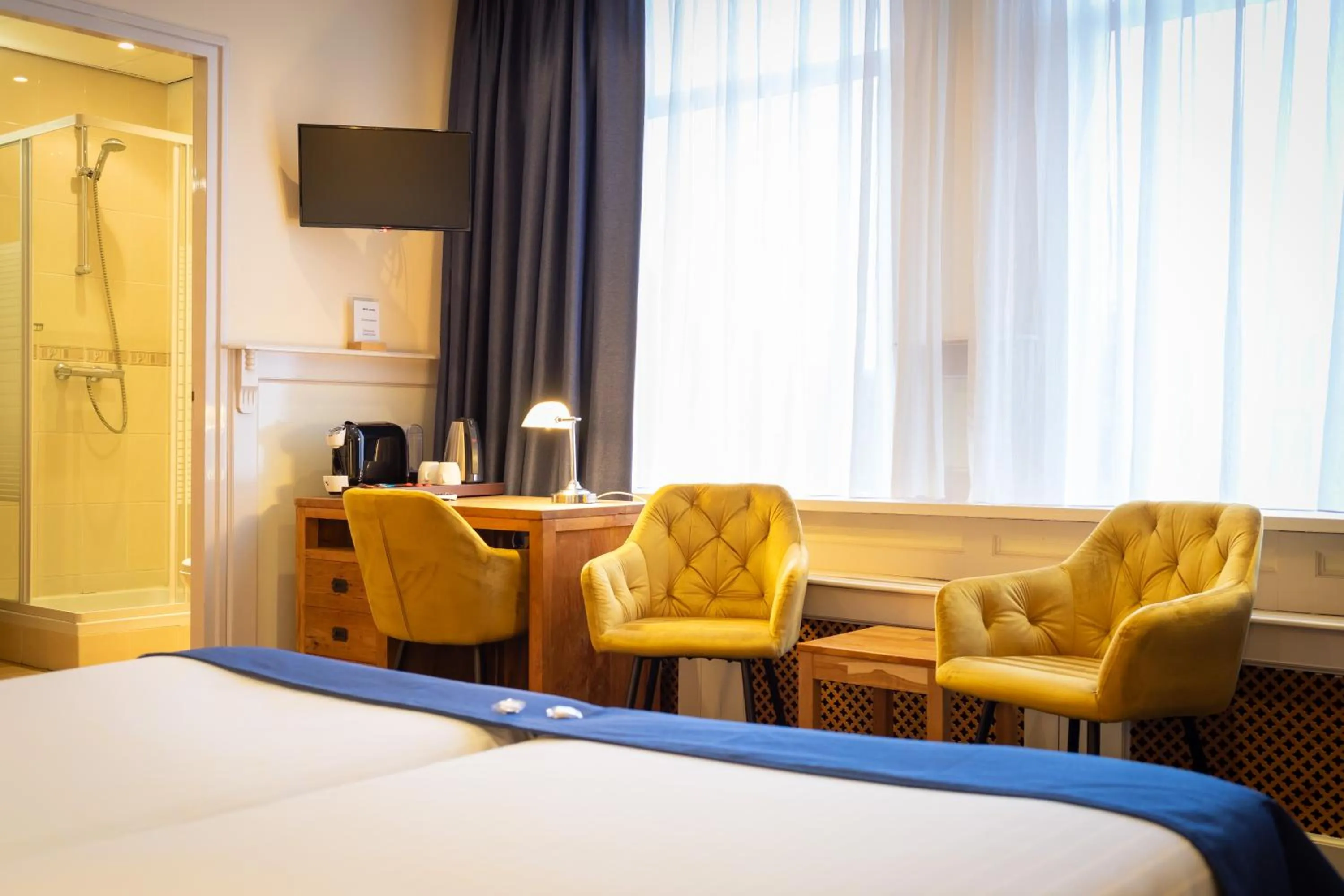 Bed in Hotel de Gulden Leeuw