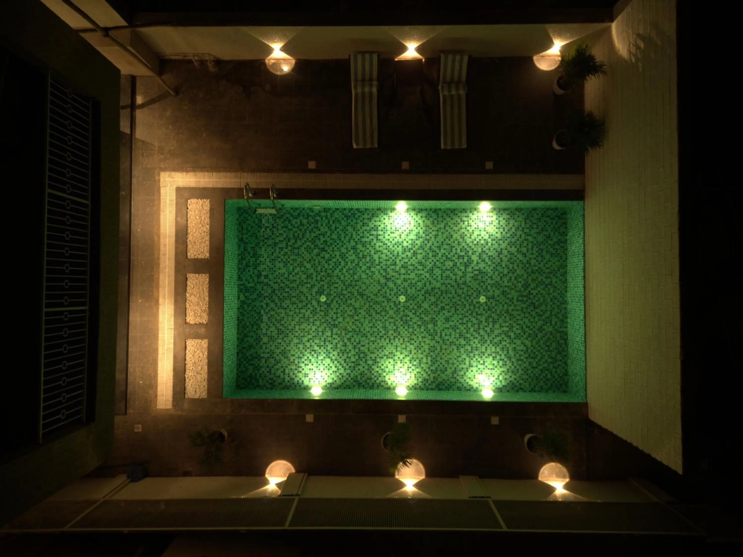 Swimming pool in Bedzzz Xclusiv Morjim, Goa By Leisure Hotels