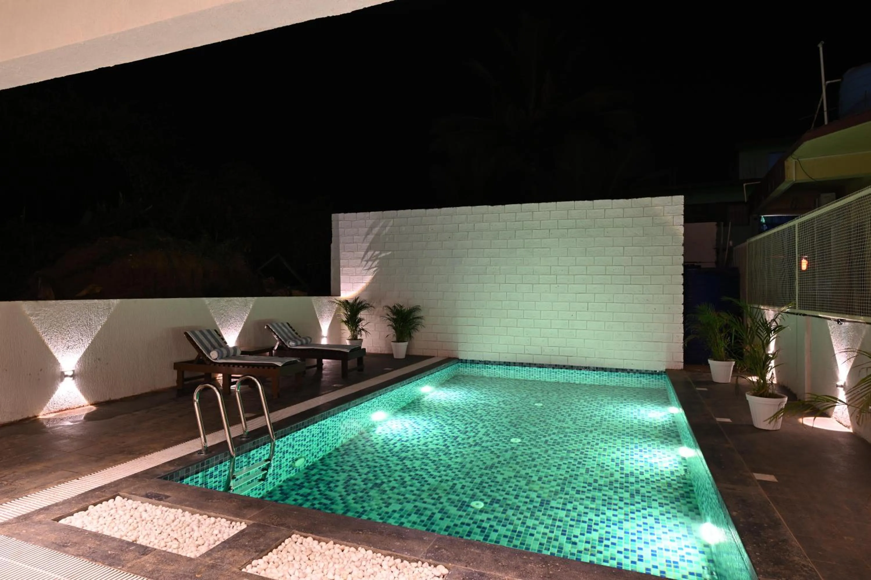 Swimming pool in Bedzzz Xclusiv Morjim, Goa By Leisure Hotels