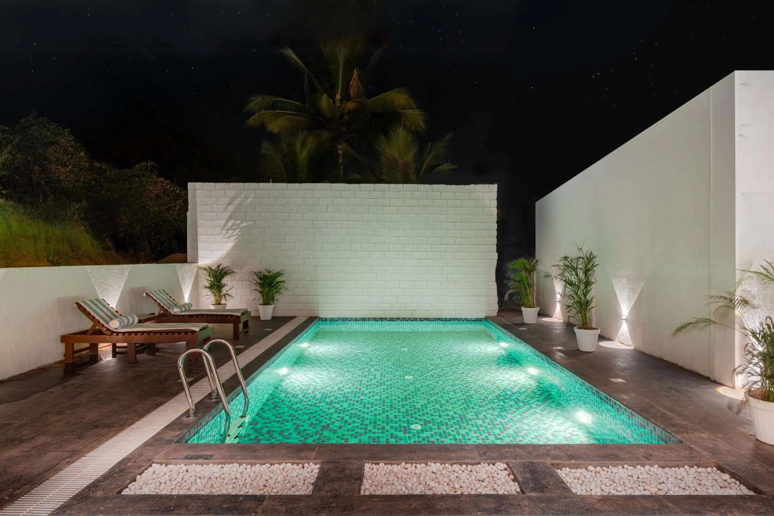 Swimming pool in Bedzzz Xclusiv Morjim, Goa By Leisure Hotels
