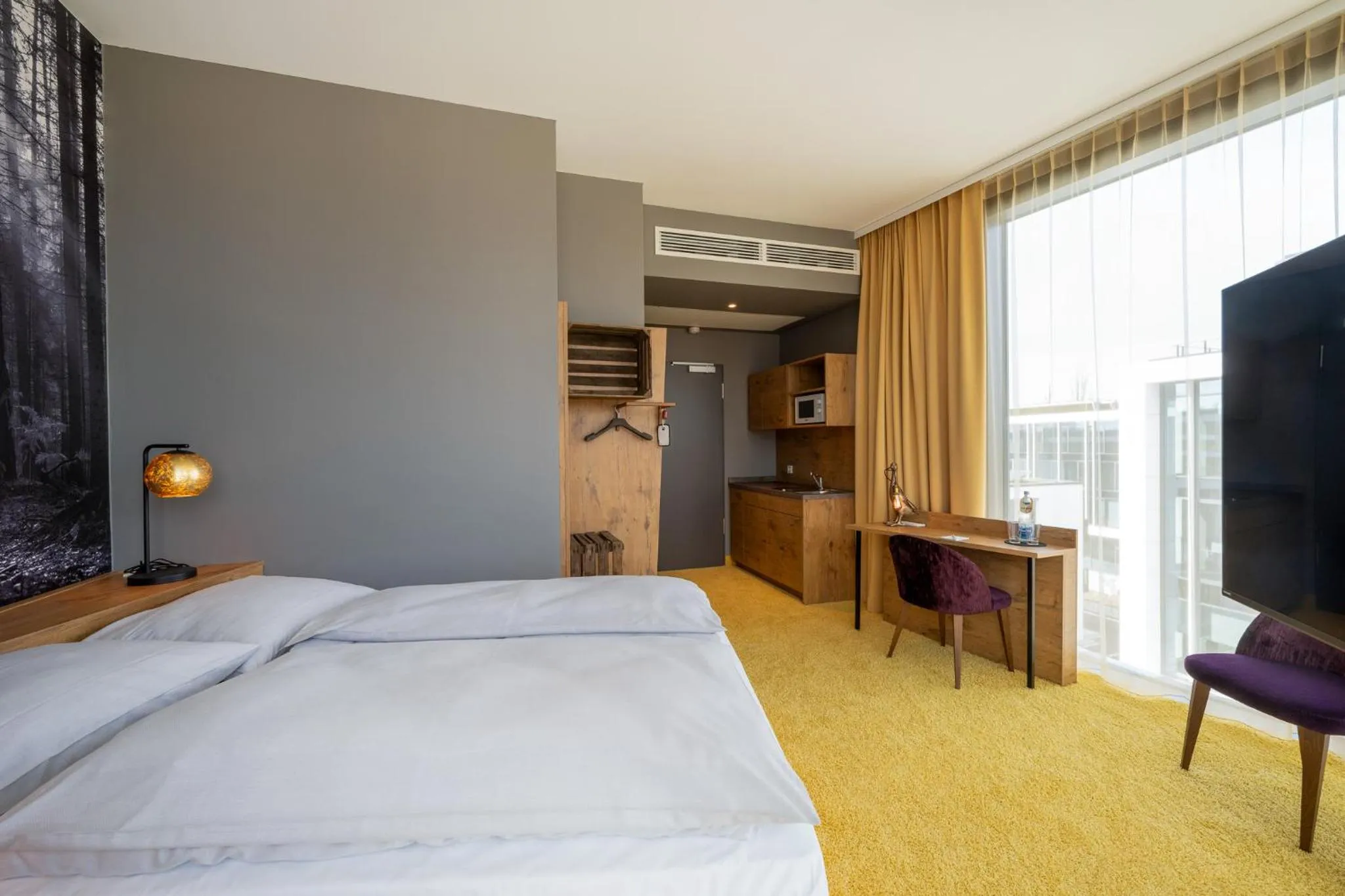 Photo of the whole room, Bed in mightyTwice Hotel Achern