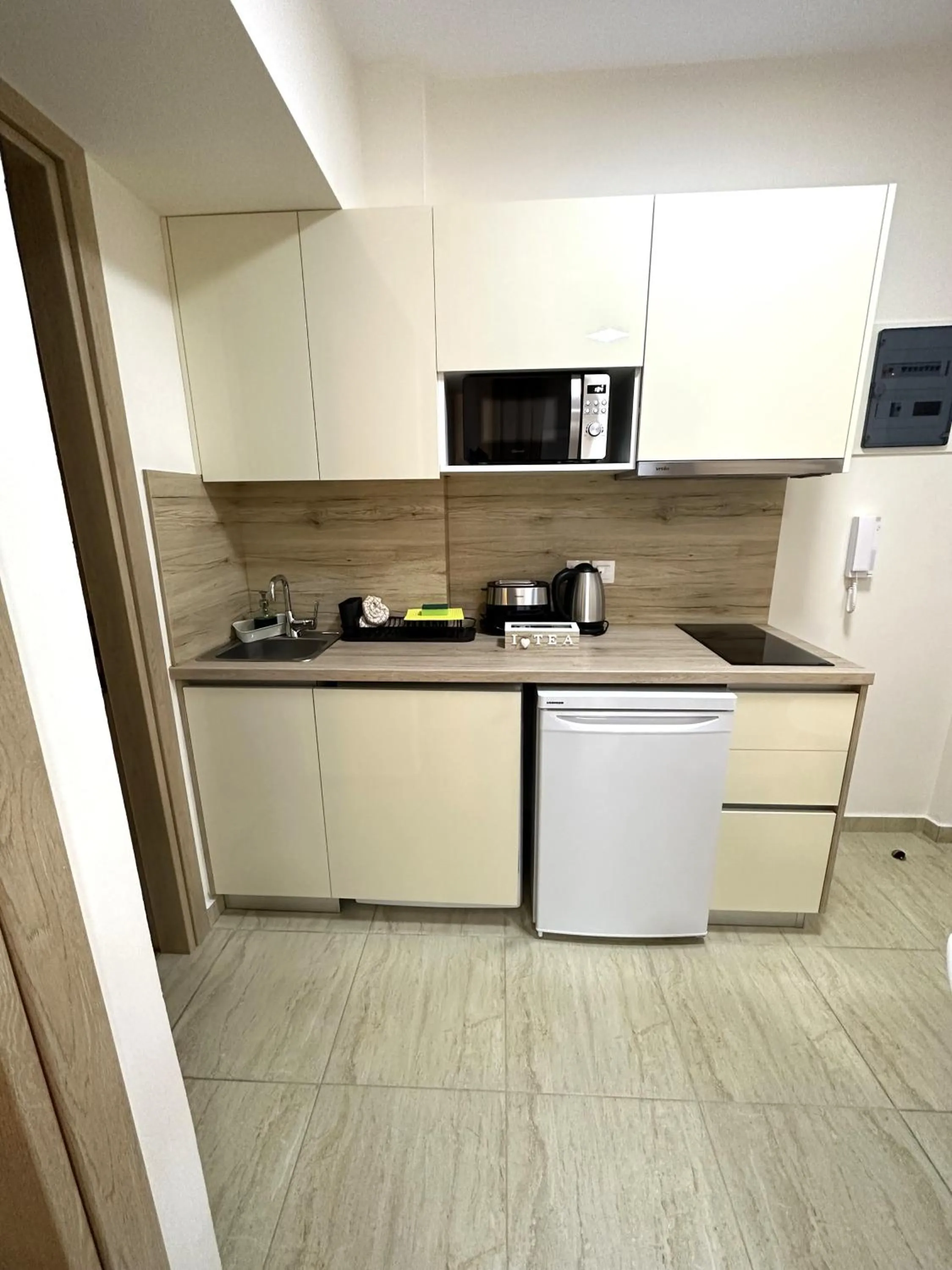 Kitchen or kitchenette in Navarino Luxe Suites