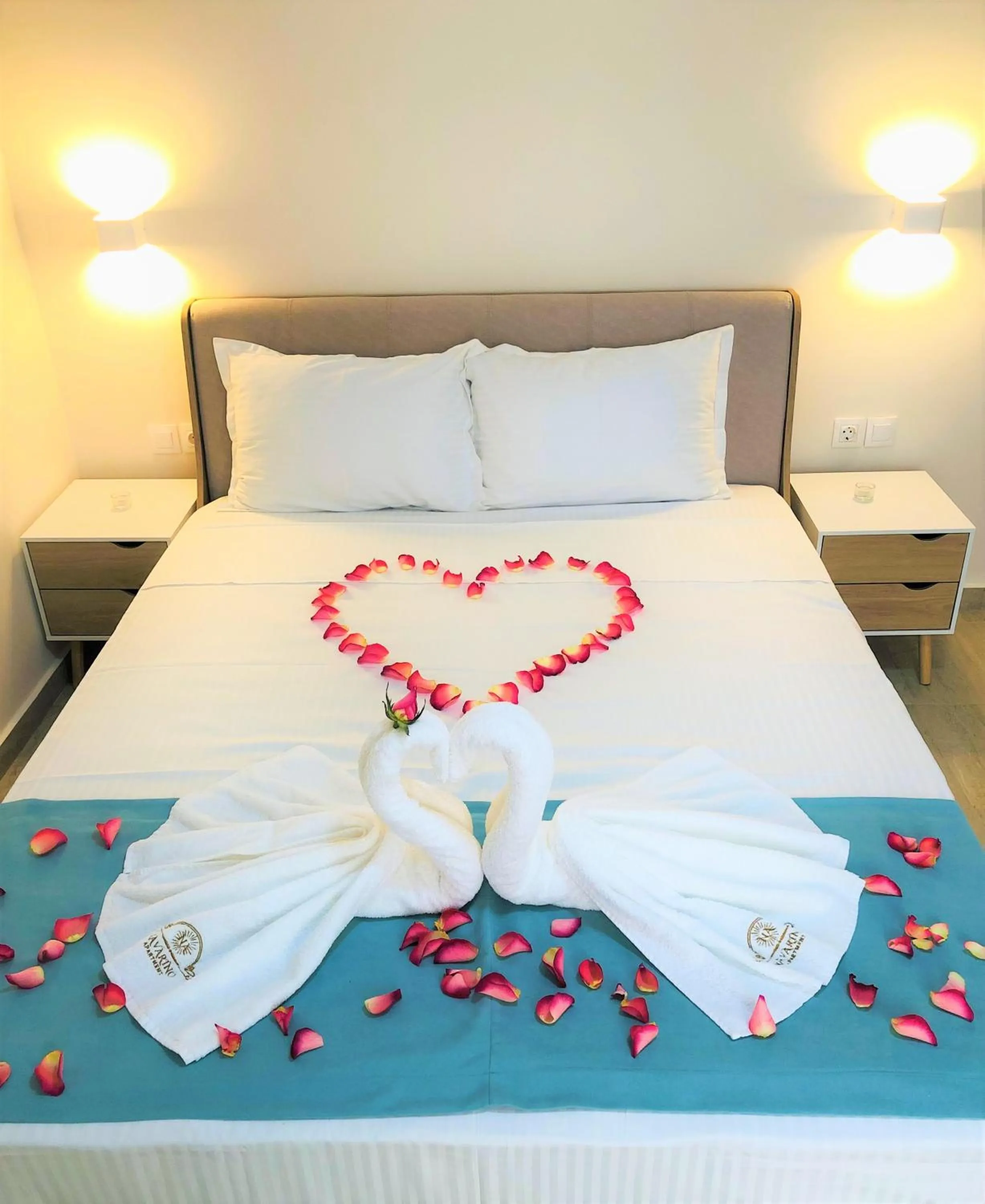 Bed in Navarino Luxe Suites