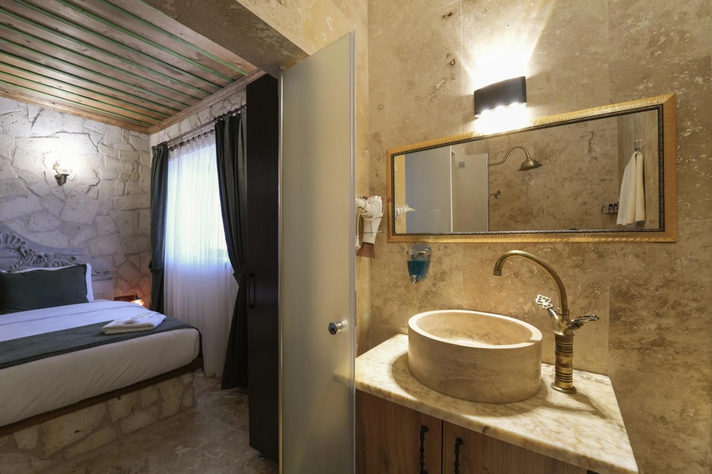 Shower, Bed in By Yüksel Cave