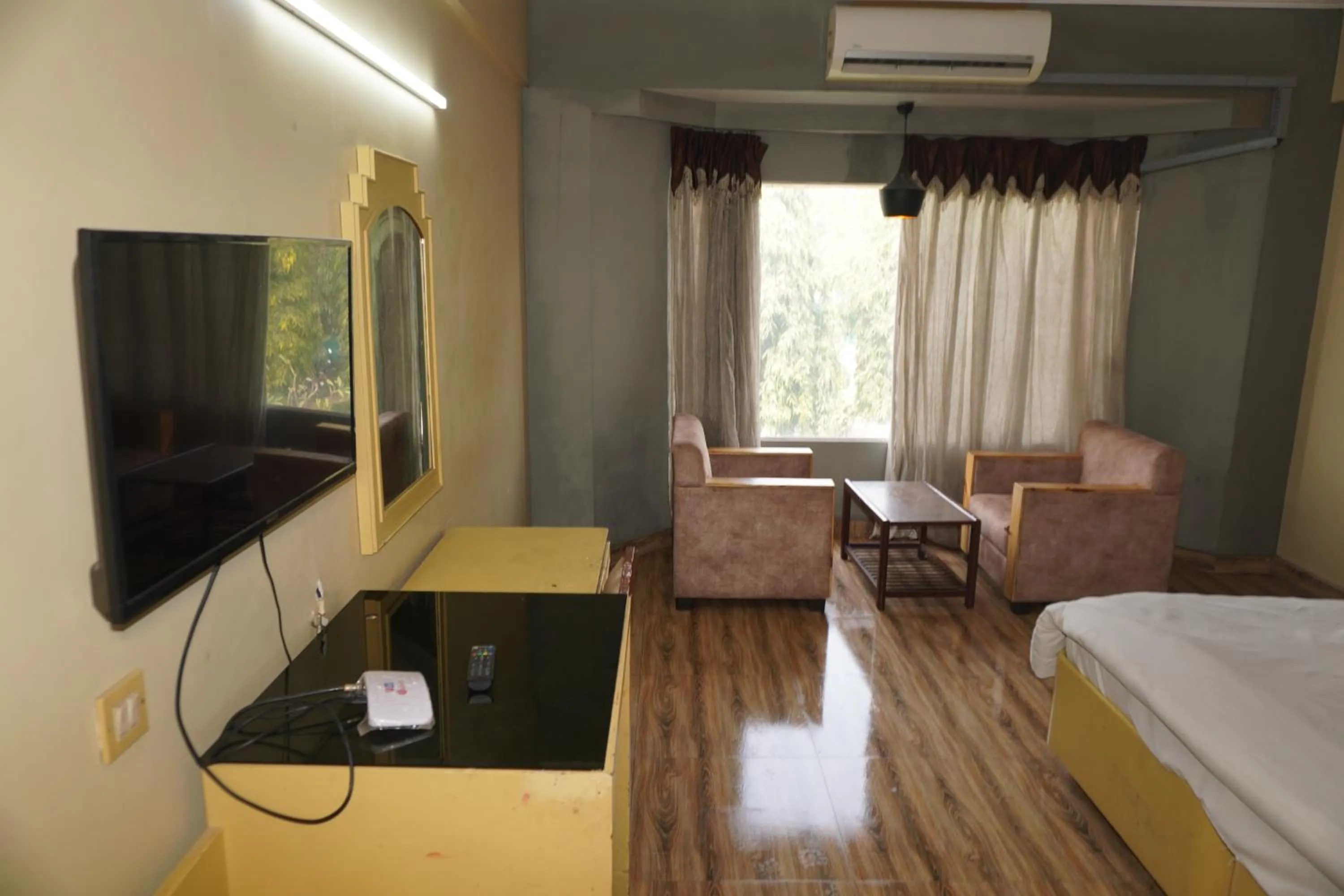 Bed in Hotel Maya international