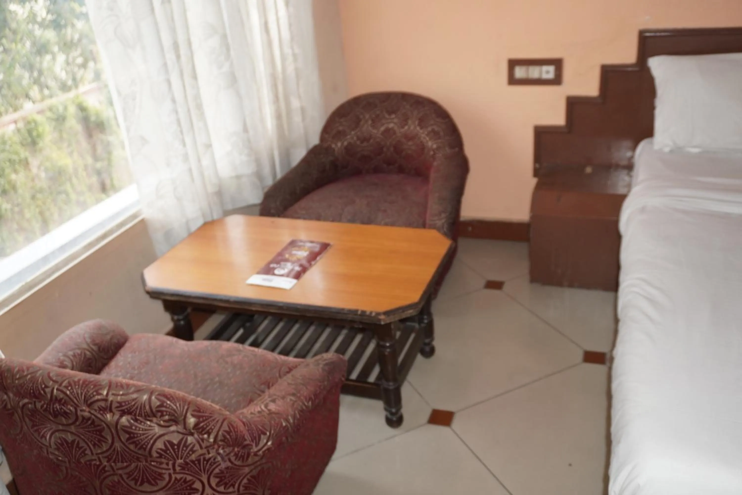 Bed in Hotel Maya international