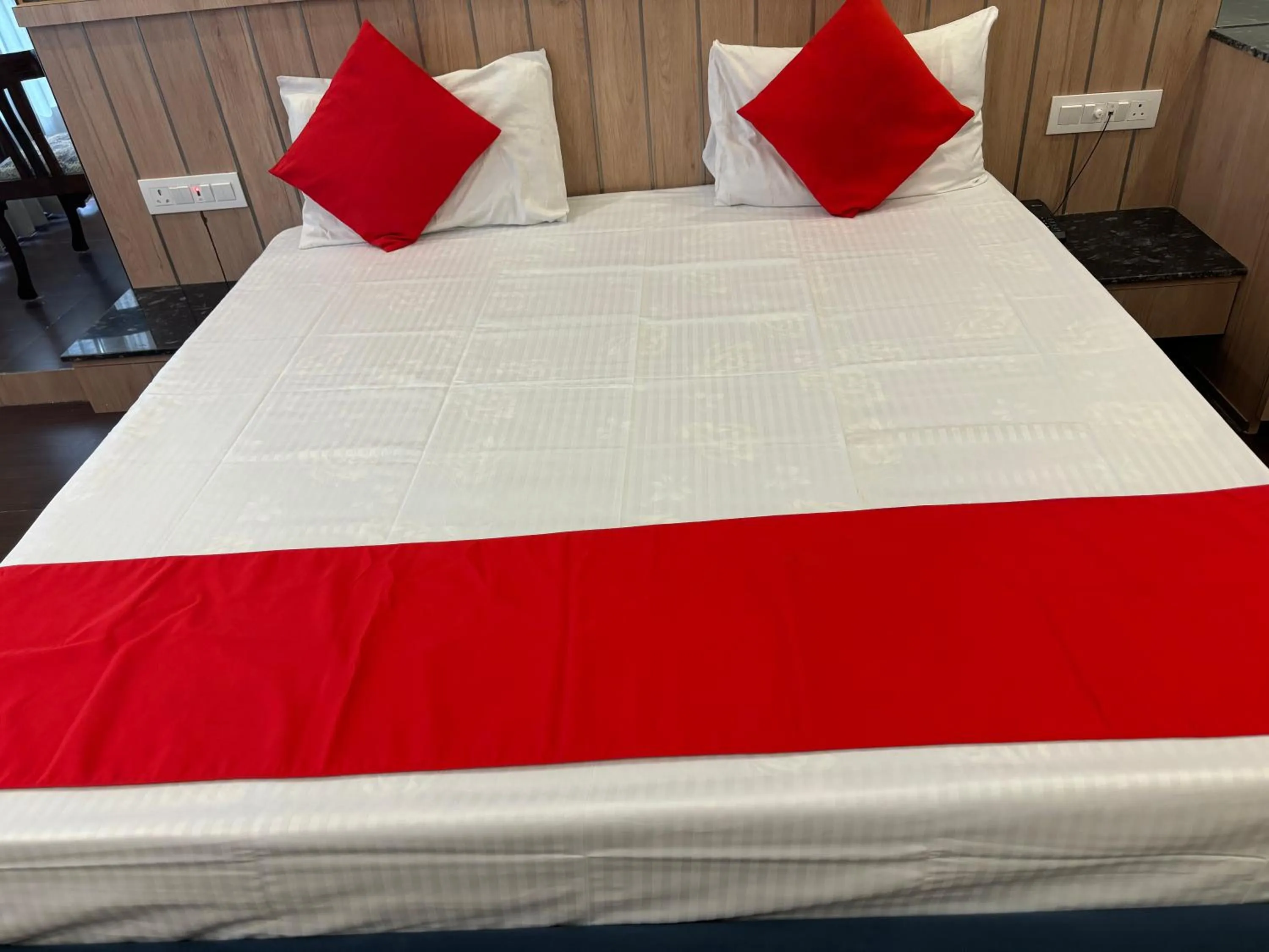 Bed in Hotel Maya international