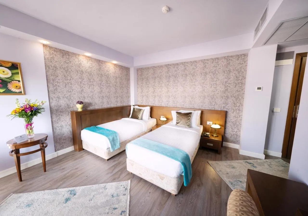 Bed in Phoenicia Comfort Hotel