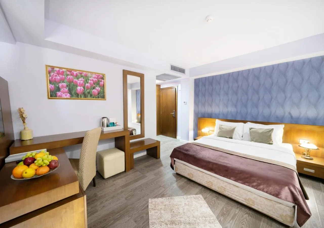 Bed in Phoenicia Comfort Hotel