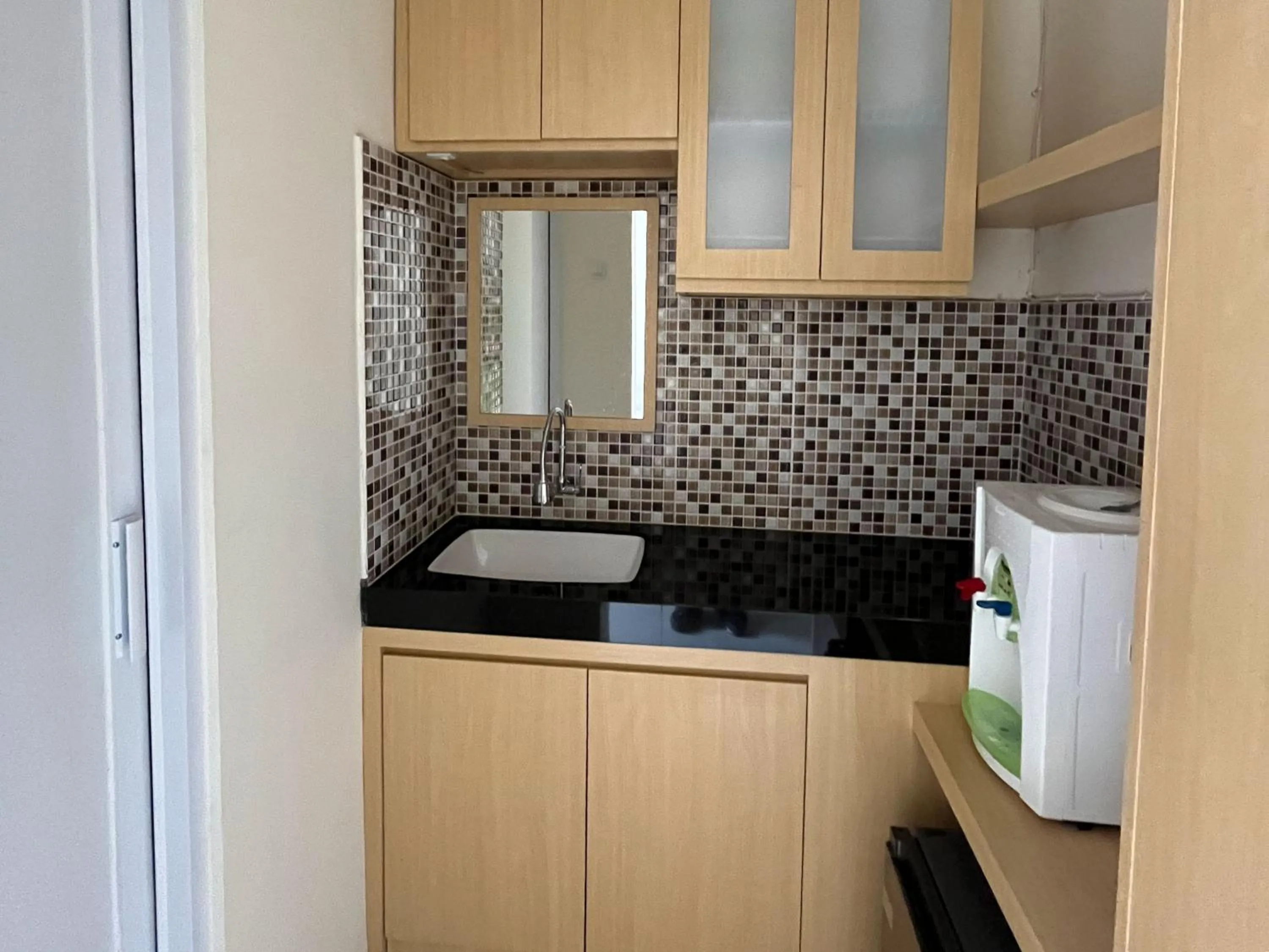 Kitchen or kitchenette in Urbanview Indria Inn Solo by RedDoorz