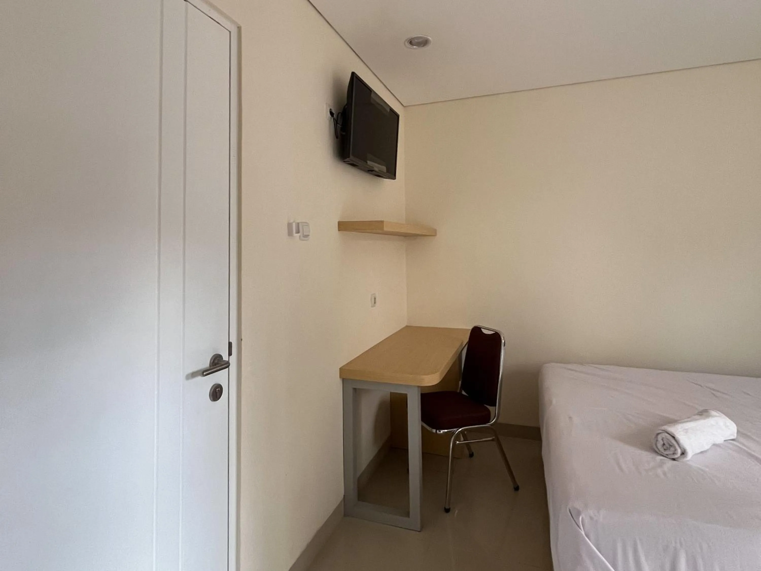 Bedroom, Bed in Urbanview Indria Inn Solo by RedDoorz