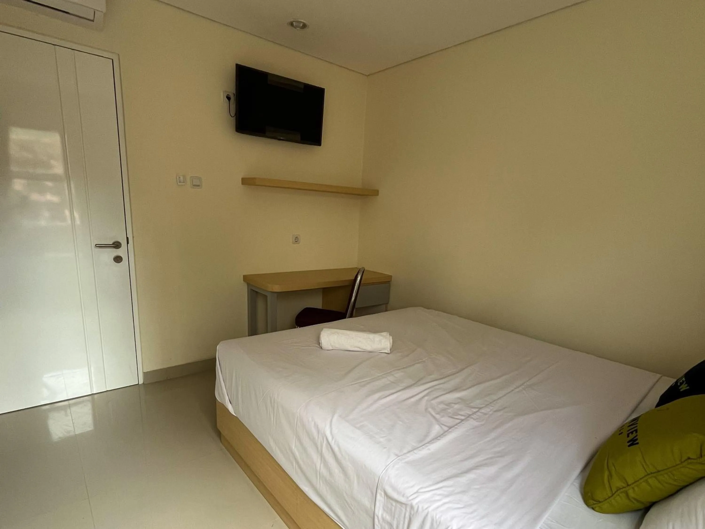 Bedroom, Bed in Urbanview Indria Inn Solo by RedDoorz