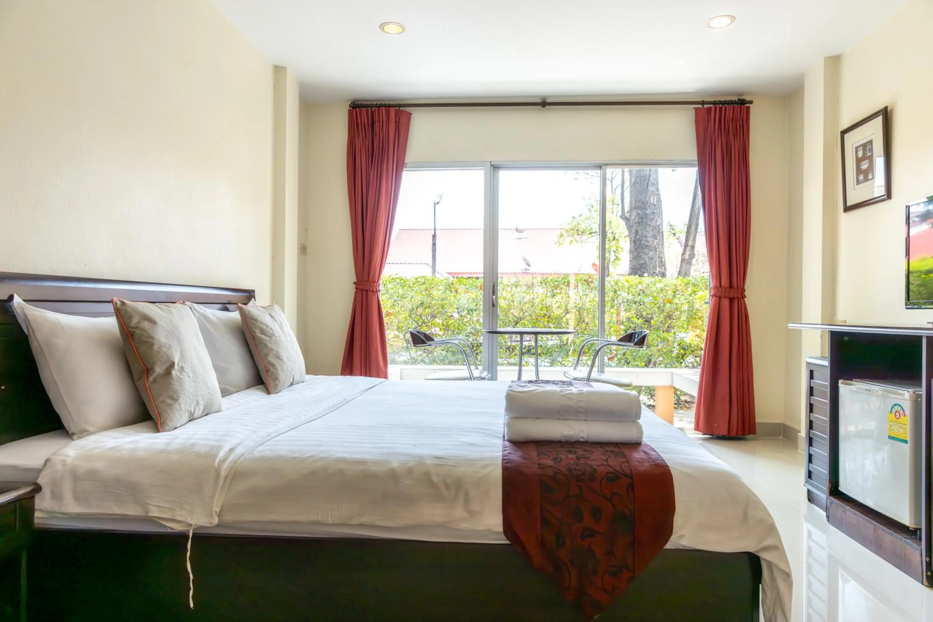 Bed in Kiatthada Resort