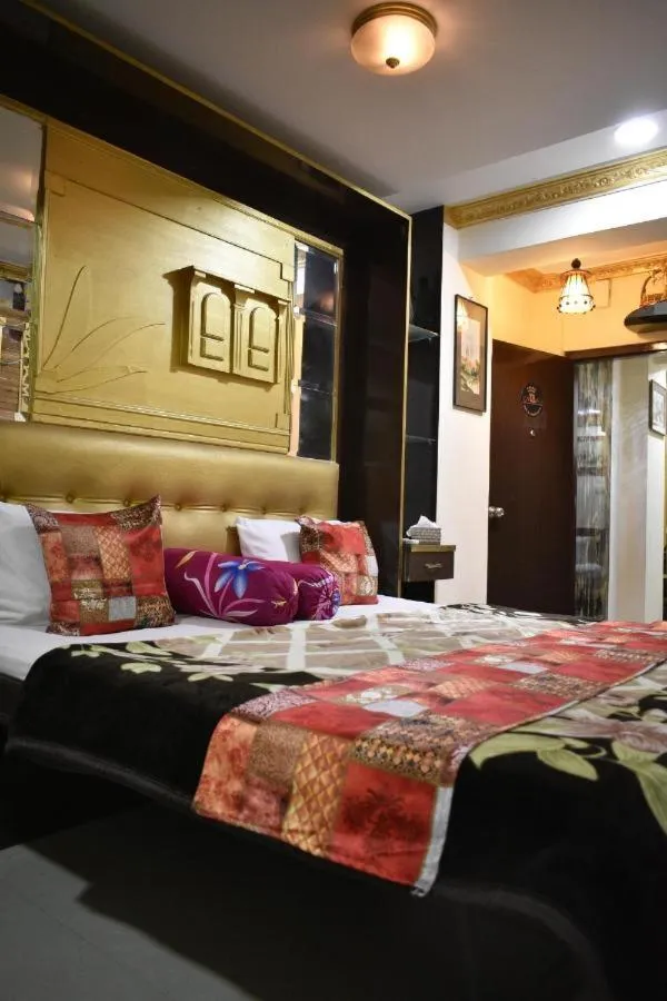 Bed in Ya Inn Rooms & Suites